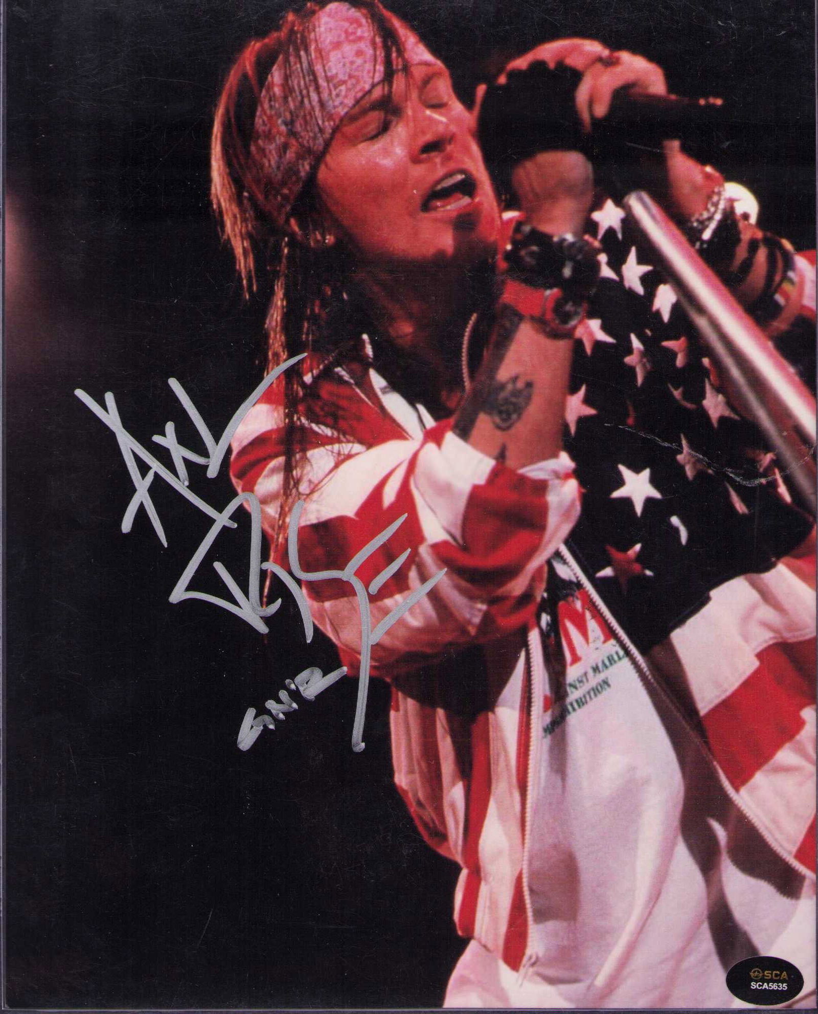 Axl Rose signed photograph B: A wonderful in person signed 8x10 of the legendary Guns N Roses front man Certificate of AuthenticityEVERY item in this auction comes with at minimum one fully illustrated and serial numbered COA sign