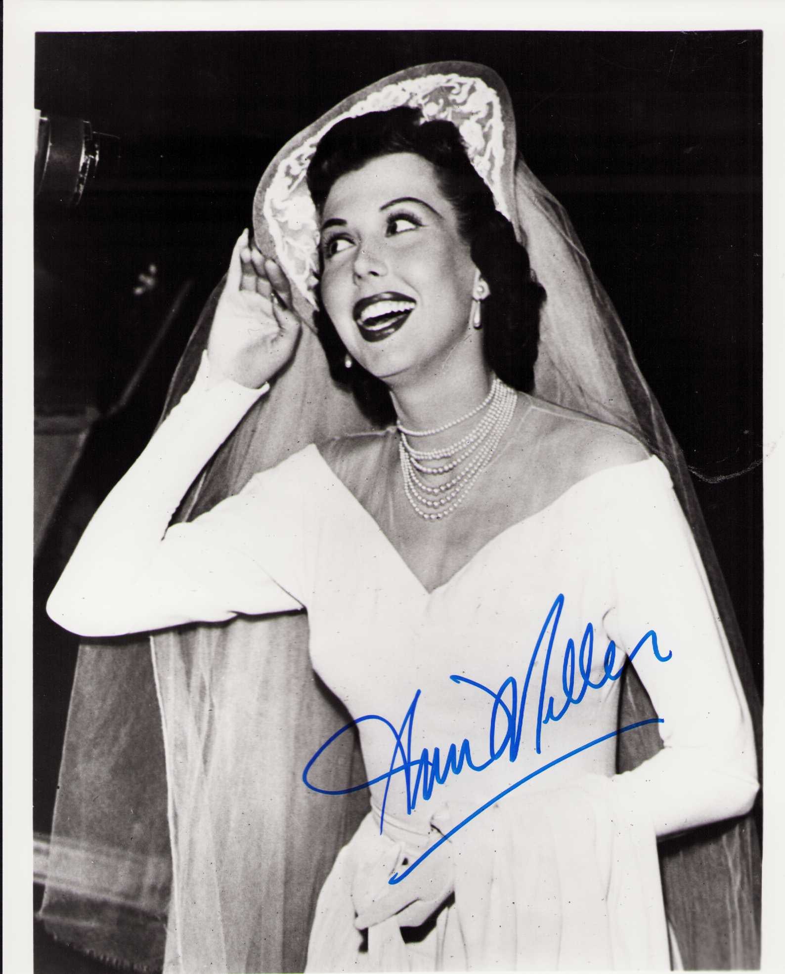 Ann Miller signed photograph: A vintage signed 8x10 of the legend Certificate of AuthenticityEVERY item in this auction comes with at minimum one fully illustrated and serial numbered COA signed by the worlds leading authenticator