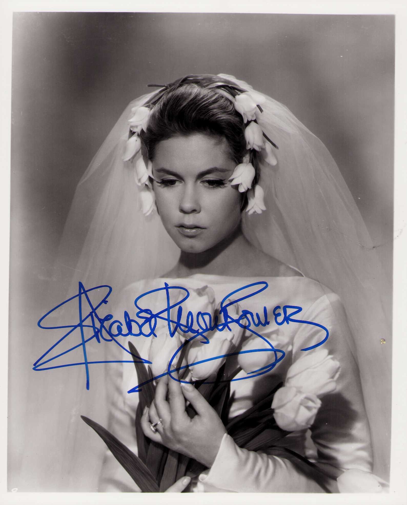 Elizabeth Montgomery signed photograph: A rare nice vintage signed 8x10 of the Bewitched star Certificate of AuthenticityEVERY item in this auction comes with at minimum one fully illustrated and serial numbered COA signed by the worlds lea