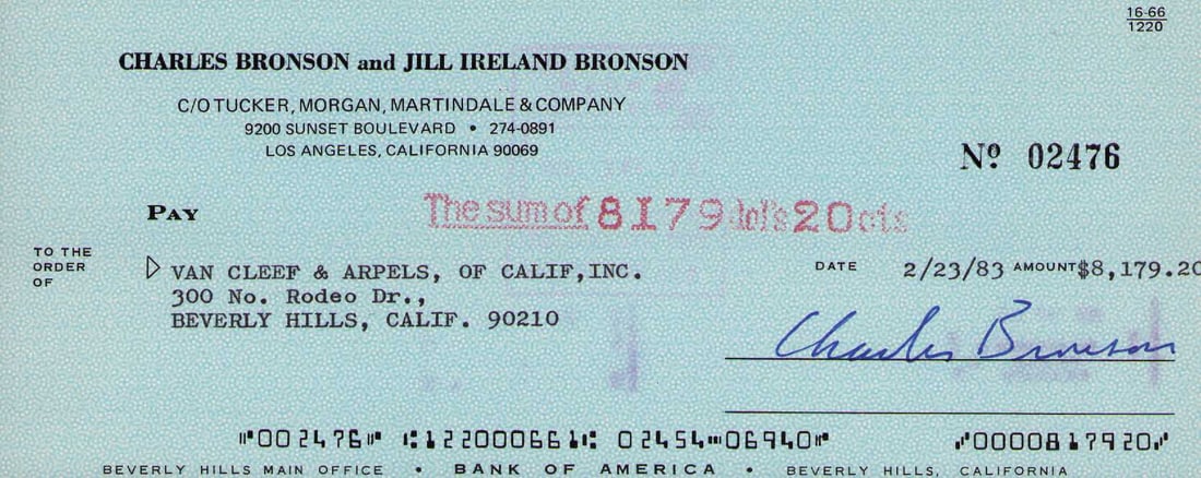 Charles Bronson signed bank check: A nice bank check signed by the first action star Charles Bronson Certificate of AuthenticityEVERY item in this auction comes with at minimum one fully illustrated and serial numbered COA signed by th