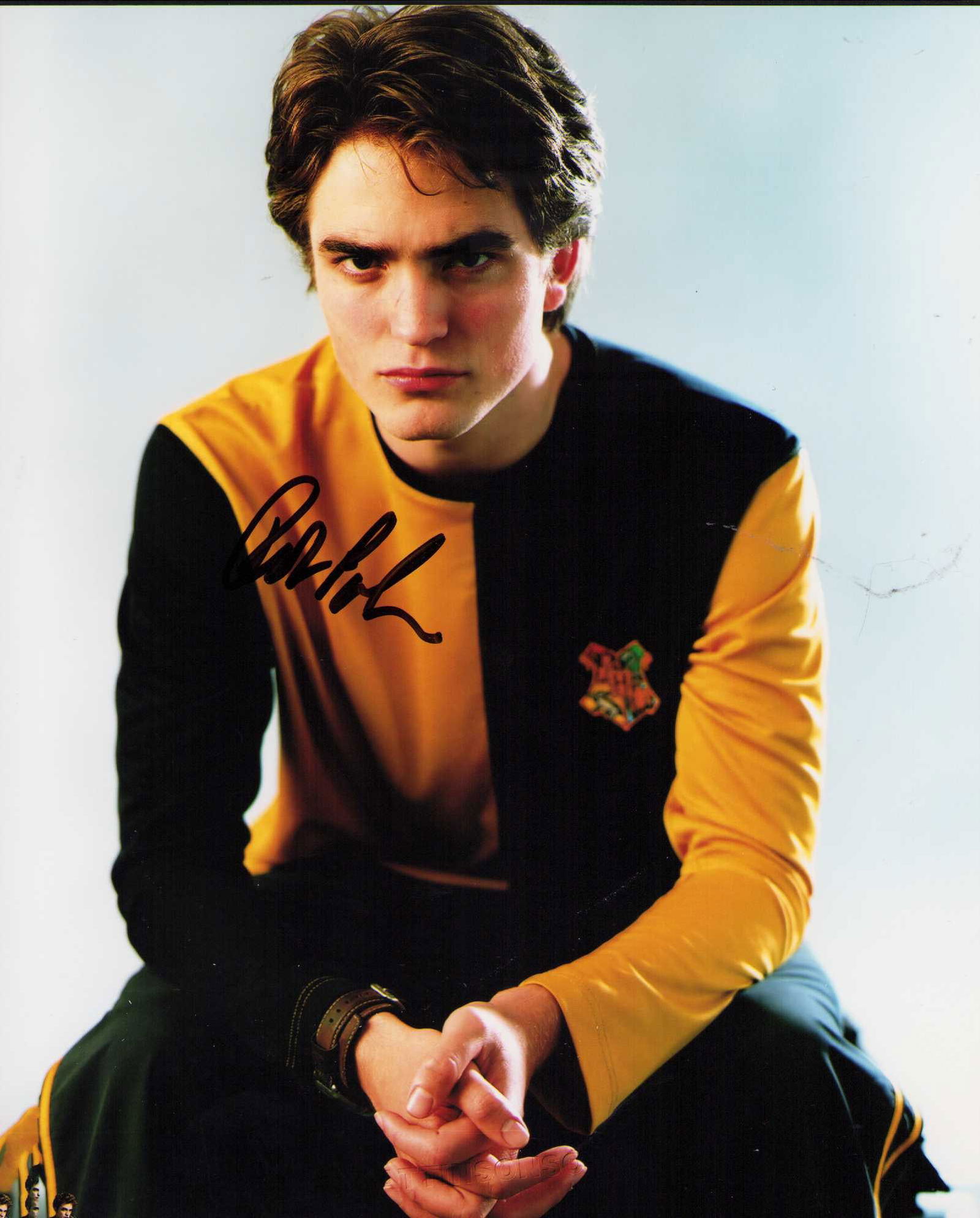 Robert Pattinson signed Harry Potter photograph: A scarce Harry Potter signed 8x10 before he did Twilight and his career broke out ! ate of AuthenticityEVERY item in this auction comes with at minimum one fully illustrated and serial numbered COA si