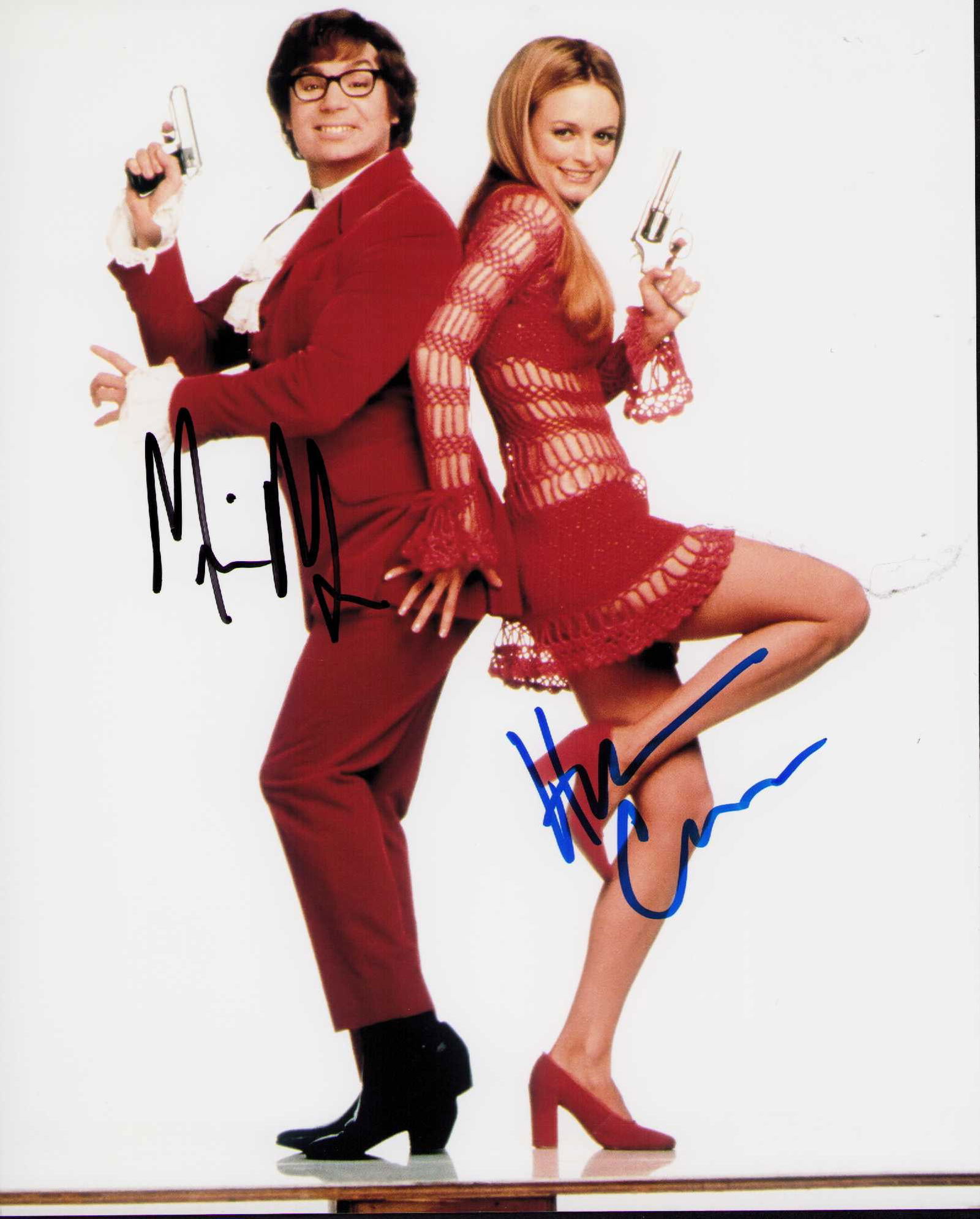 Austin Powers cast signed photograph: A cast signed 8x10 by Mike Myers as Austin Powers and by Heather Graham ate of AuthenticityEVERY item in this auction comes with at minimum one fully illustrated and serial numbered COA signed by the