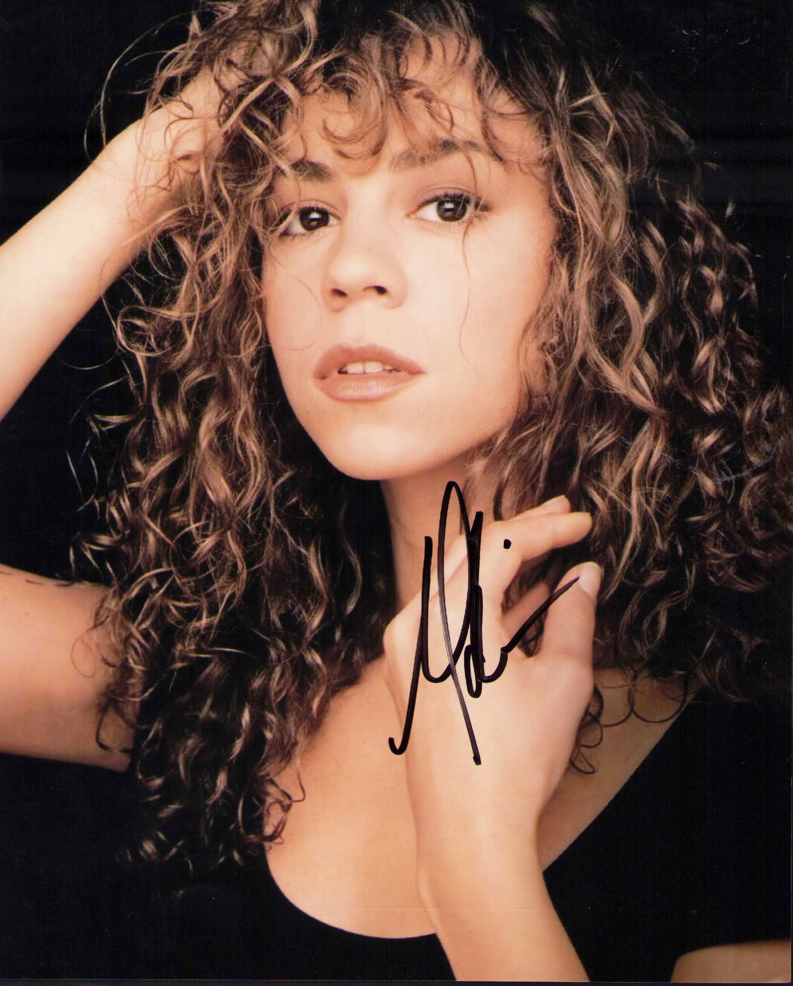 Mariah Carey signed photograph: A nice vintage portrait of the Diva singer sometimes actress ate of AuthenticityEVERY item in this auction comes with at minimum one fully illustrated and serial numbered COA signed by the worlds