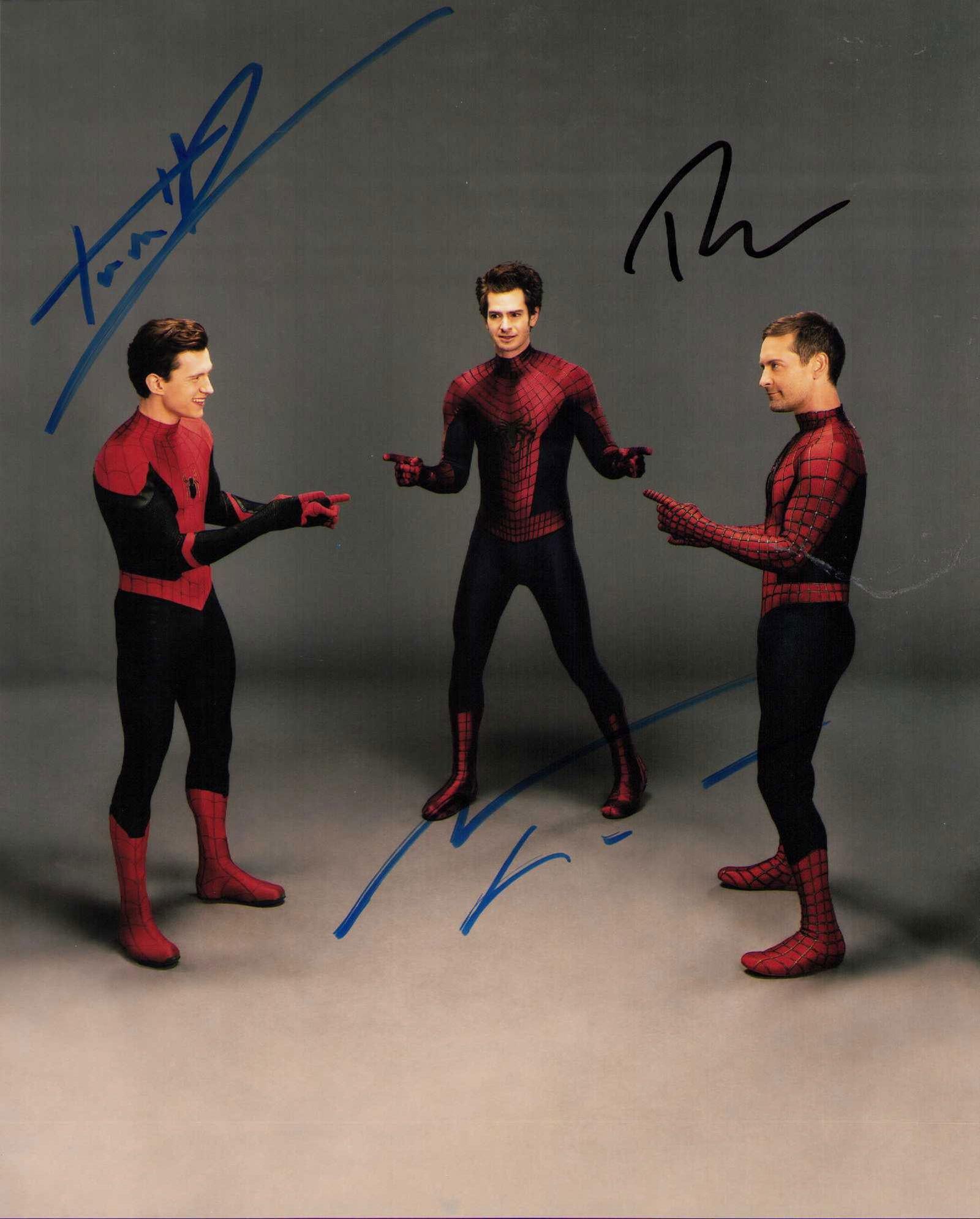 RARE Spidermen signed photograph: A rare signed 8x10 by all three stars ti play Spiderman Tobey Maguire Andrew Garfield and Tom Holland ! ate of AuthenticityEVERY item in this auction comes with at minimum one fully illustrated and