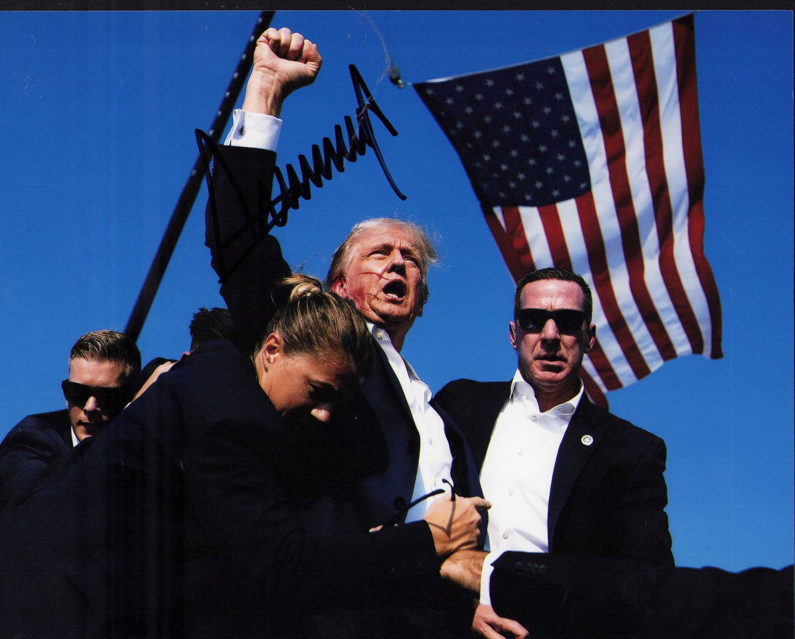 Donald trump rare assasination attempt signed photograph: THE world wide famous shot signed by the President while President at a fund raiser for the Republican National Committee at Mar-a-Lago for a reporter ate of AuthenticityEVERY item in this auction com