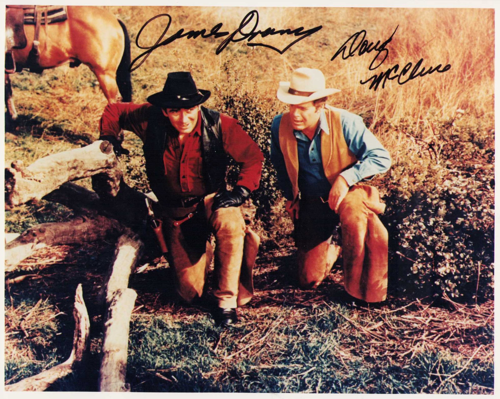 Doug McClure and James Drury Virginian signed photograph: Virginian signed vintage still by both stars Doug McClure and James Drury Certificate of AuthenticityEVERY item in this auction comes with at minimum one fully illustrated and serial numbered COA sign