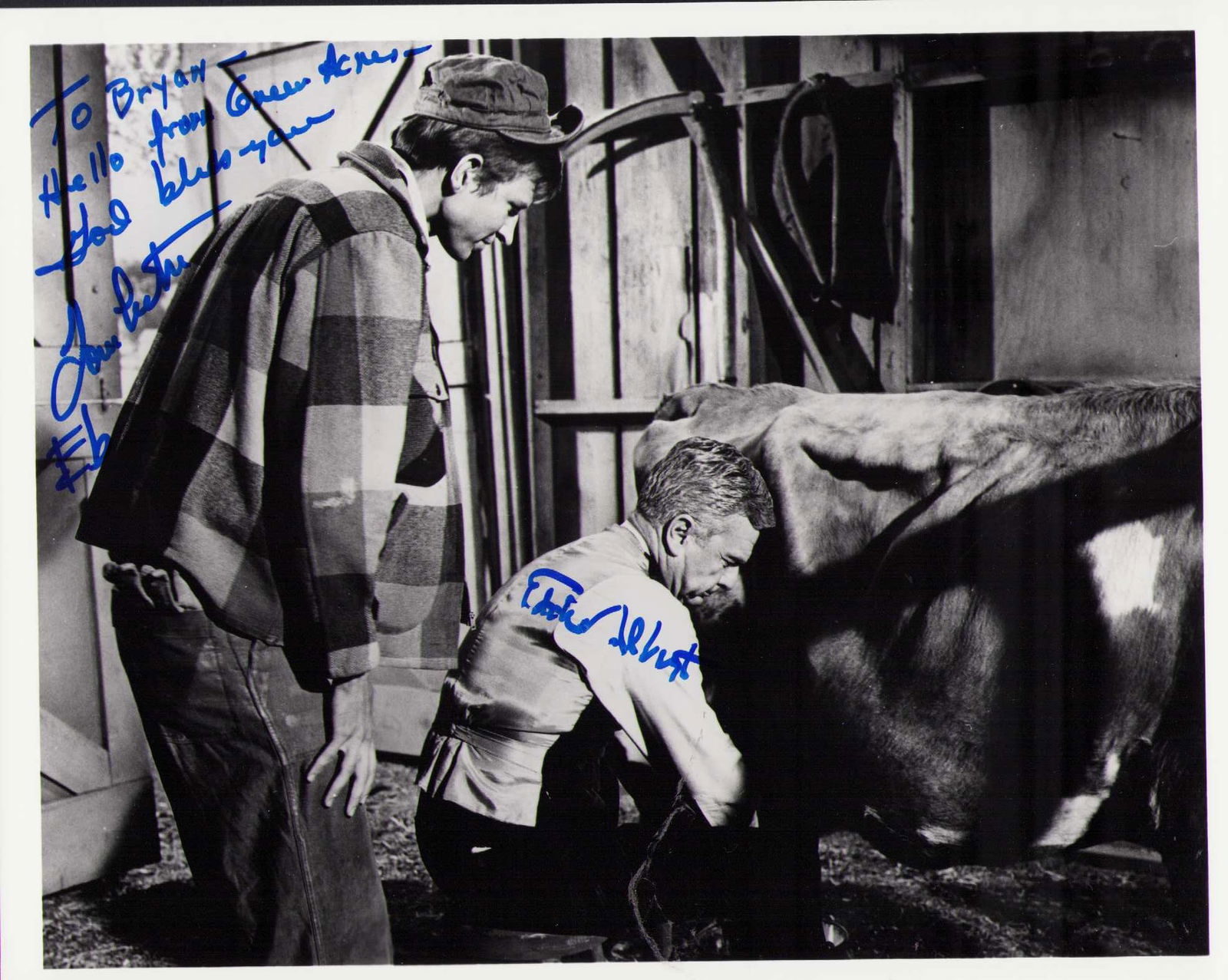 Green Acres signed cast photograph: A Green Acres scene signed by Eddie Albert and Tom Lester as Eb Certificate of AuthenticityEVERY item in this auction comes with at minimum one fully illustrated and serial numbered COA signed by the