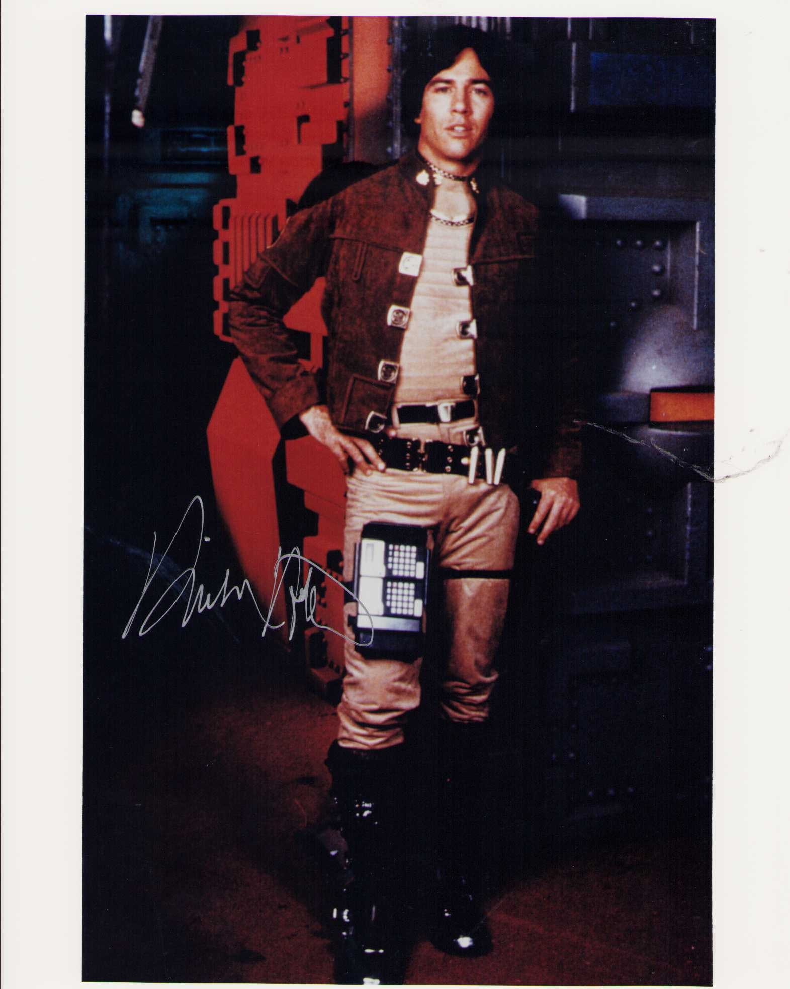 Richard Hatch signed photograph Battlestar Galactica: Capt Appollo in the original Battlestar Galactica series signed 8x10 deceased star Richard Hatch Certificate of AuthenticityEVERY item in this auction comes with at minimum one fully illustrated and s