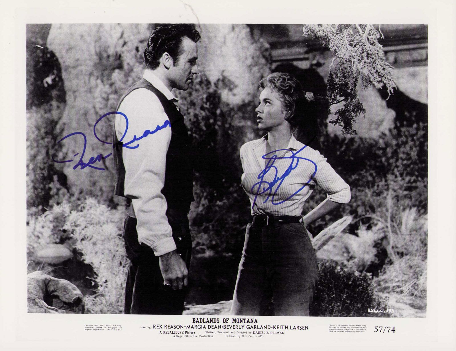 Beverly Garland and Rex Reason signed photograph: Badlands of Montana still signed by stars Beverly Garland and Rex Reason Certificate of AuthenticityEVERY item in this auction comes with at minimum one fully illustrated and serial numbered COA signe