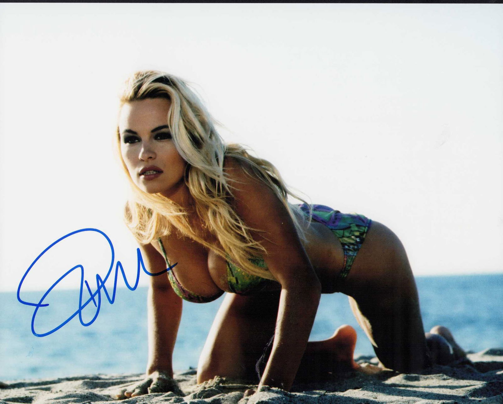 Pamela Anderson signed sexy photograph: Sexy bikini clad Pamela Anderson signed 8x10 photograph Certificate of AuthenticityEVERY item in this auction comes with at minimum one fully illustrated and serial numbered COA signed by the worlds l