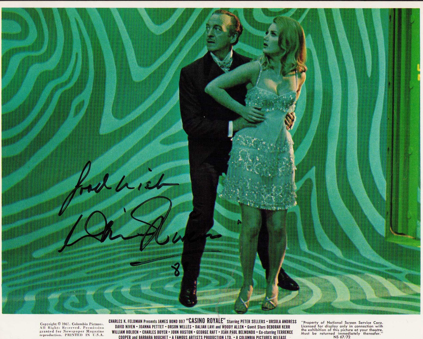 David Niven rare James Bond signed still: A RARE original lobby still 8x10 from Casino Royale where he played James Bond in a campy version in the 60s signed very rare ! Certificate of AuthenticityEVERY item in this auction comes with at