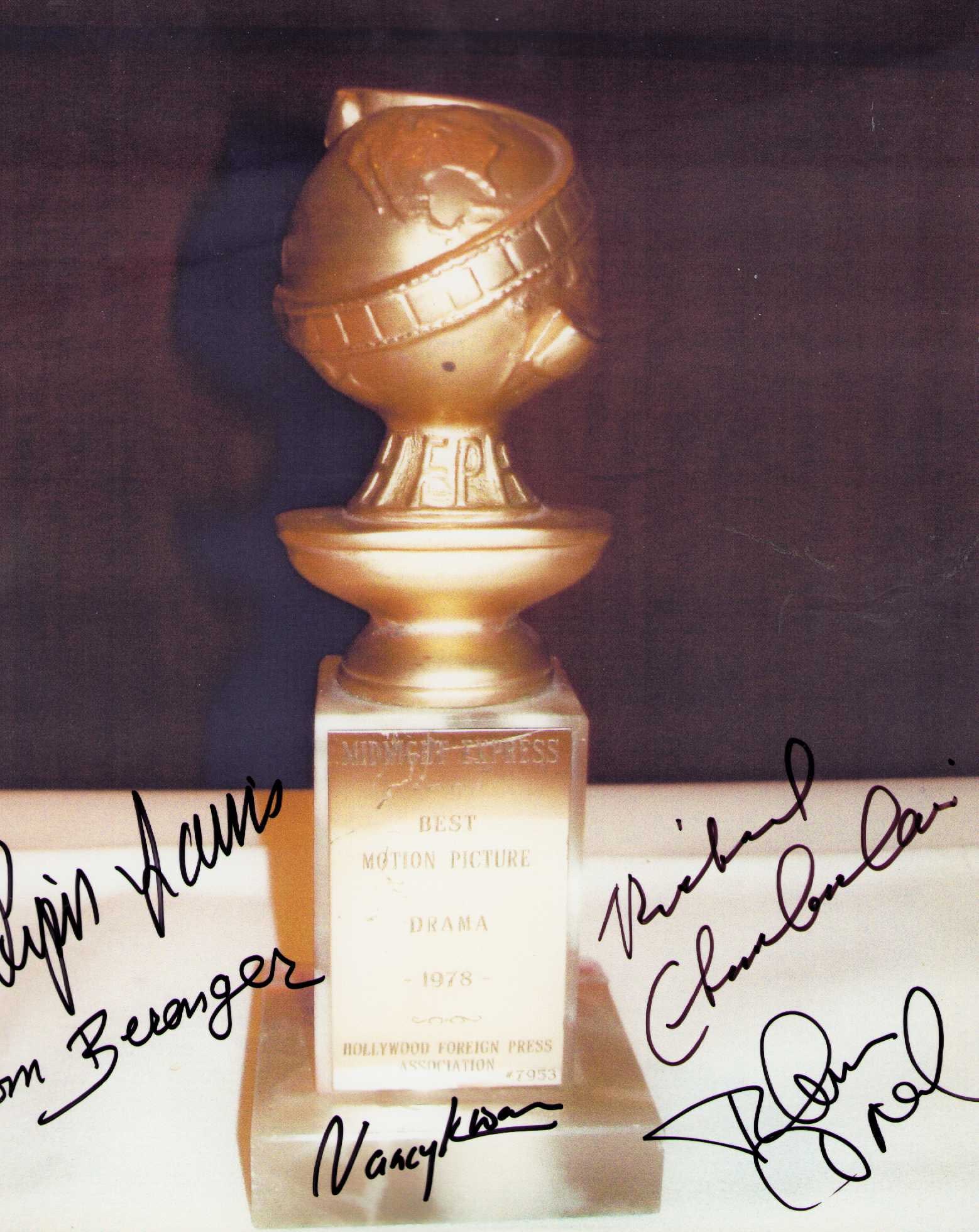 Golden Globe signed photograph by multiple legends: A 8x10 of a Golden Globe statue signed by an astonishing number of winners of the trophy Piper Laurie Tom Berenger Nancy Kwan Richard Chamberlain and Tatum O'Neal Certificate of AuthenticityEVERY