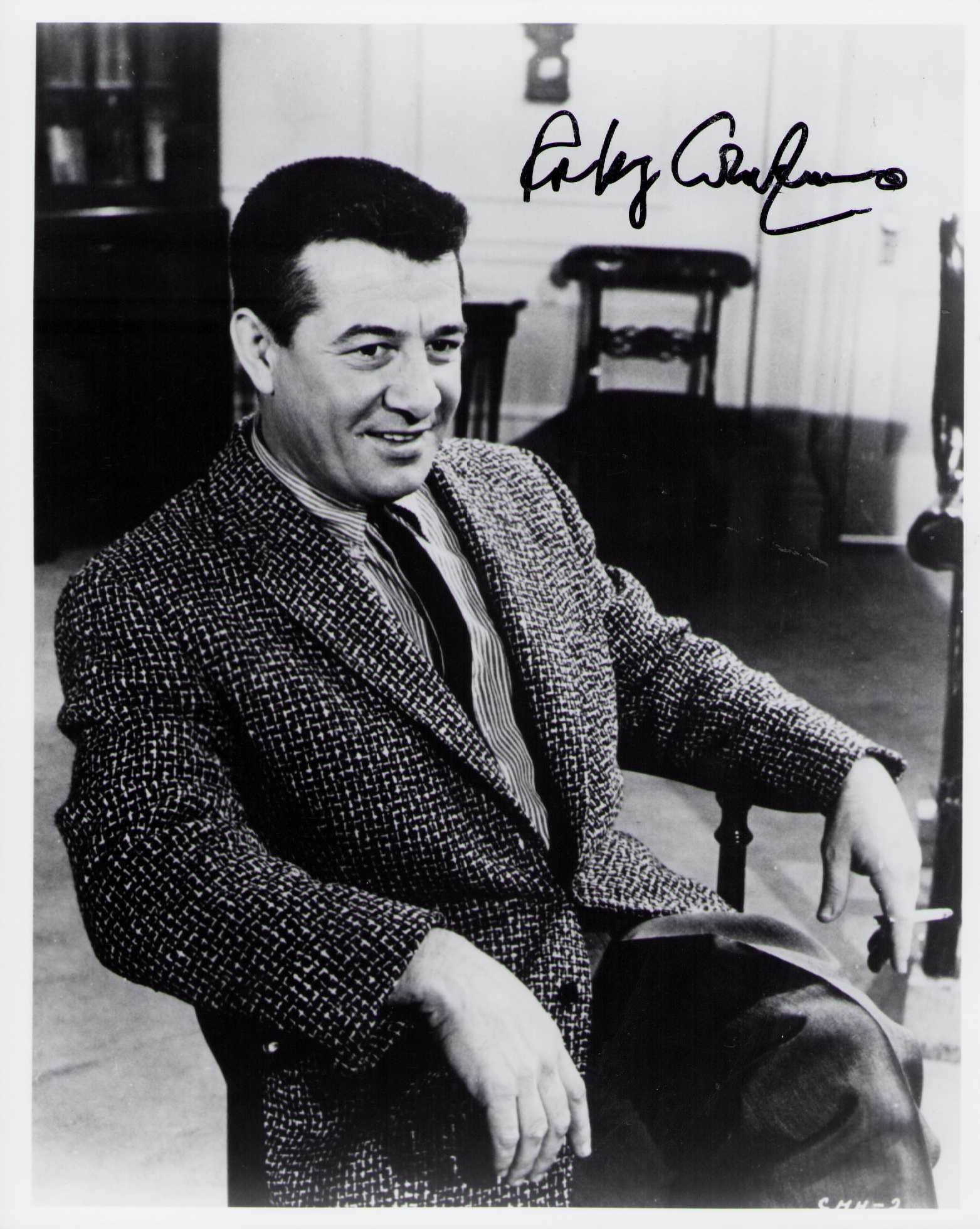 Rocky Graziano signed photograph: A scarce bw vintage signed 8x10 of the boxing legend Certificate of AuthenticityEVERY item in this auction comes with at minimum one fully illustrated and serial numbered COA signed by the worlds lead