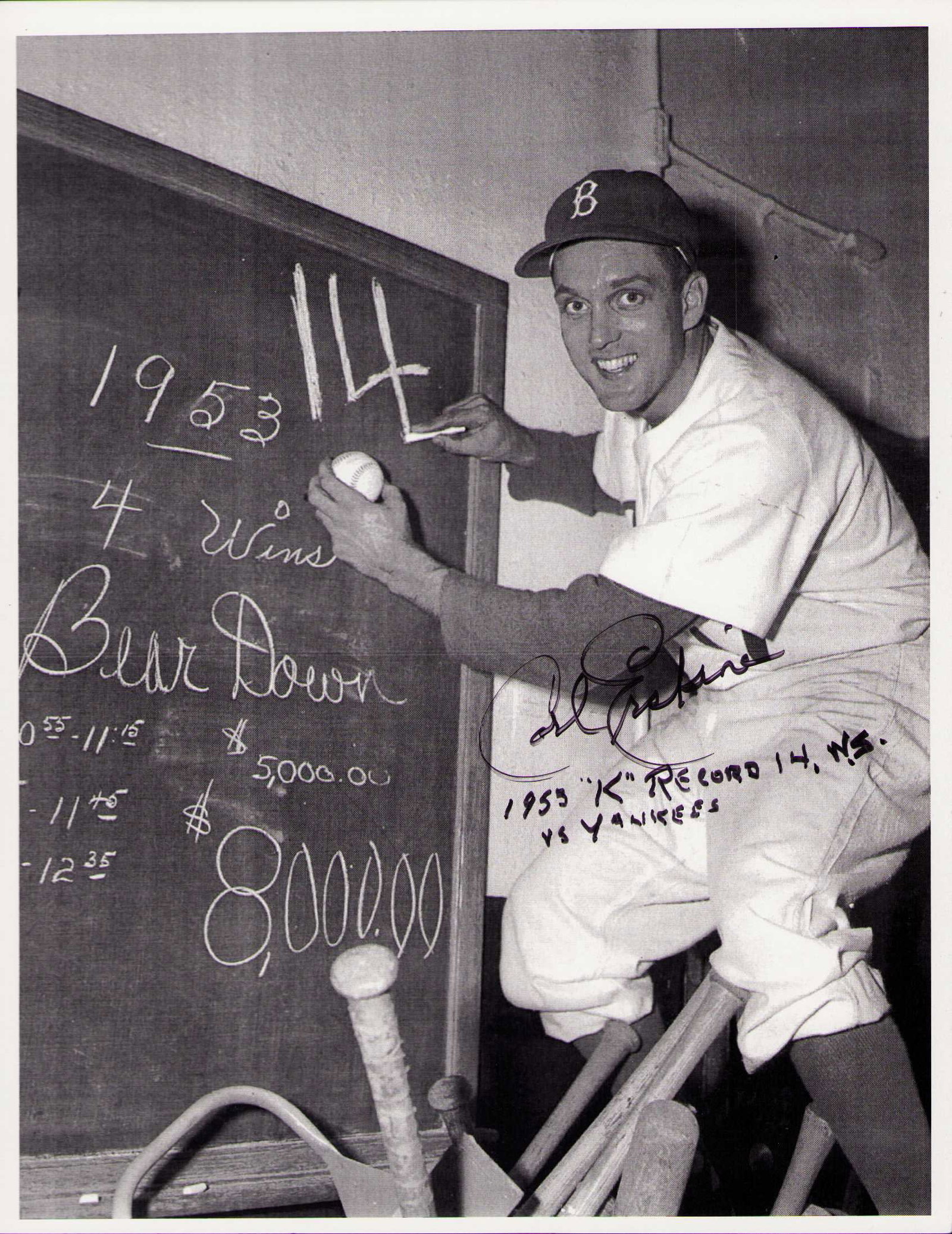 Carl Erksine signed photograph: A nice signed 8x10 of the baseball legend adding stats Certificate of AuthenticityEVERY item in this auction comes with at minimum one fully illustrated and serial numbered COA signed by the worlds