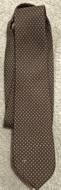 Peter Falk Columbo worn tie: A tie screen matched and worn by him in his next to last Columbo movie obtained directly from wardrobe head Faye Sloan Certificate of AuthenticityEVERY item in this auction comes with at minimum one