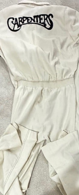 Carpenters rare jumpsuit worn on tour: A RARE White embroidered jumpsuit worn by various band members in the 70s on Carpenters tour also used in the Karen Carpenter Story bio picture rare Certificate of AuthenticityEVERY item in this