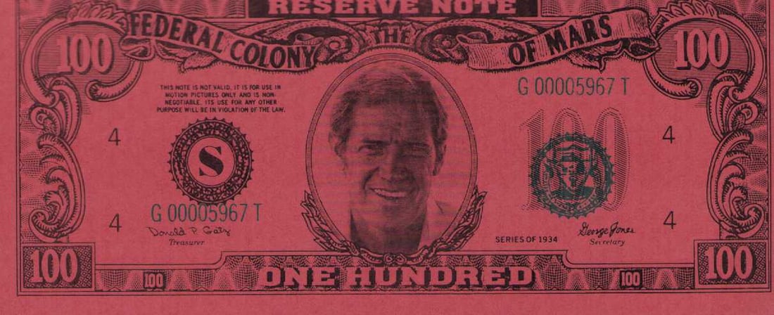 Total Recall Prop money: A rare prop piece of money used in the Schwarzenegger classic Total Recall Certificate of AuthenticityEVERY item in this auction comes with at minimum one fully illustrated and serial numbered COA