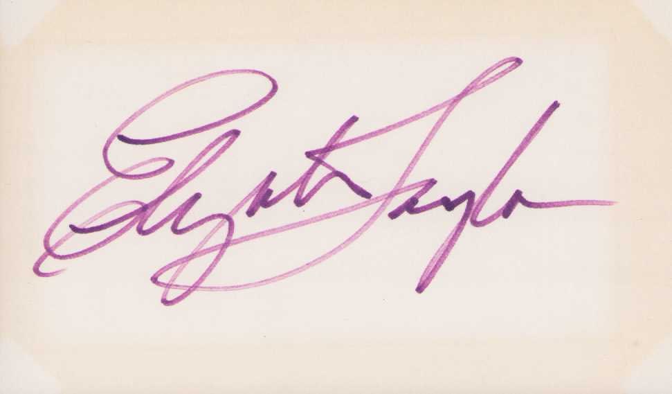 Elizabeth Taylor signature: Rare in person signature of film legend Certificate of AuthenticityEVERY item in this auction comes with at minimum one fully illustrated and serial numbered COA signed by the worlds leading authentic