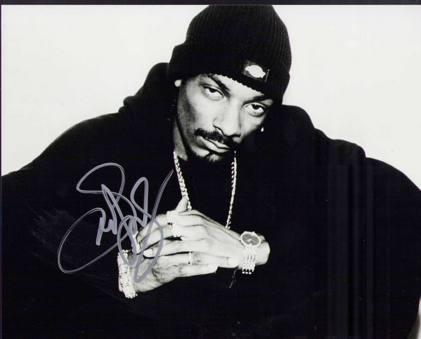 Snoop Dogg signed photograph: A nice close up of the musician and record label owner legendary Snoop Certificate of AuthenticityEVERY item in this auction comes with at minimum one fully illustrated and serial numbered COA signed