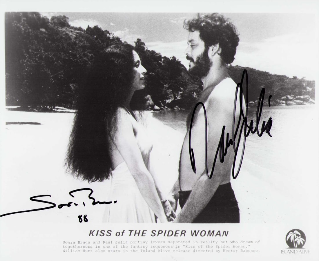 Kiss of the Spiderwoman cast signed photograph: A vintage original still signed by Raul Julia deceaed and Sonia Braga from the iconic film Certificate of AuthenticityEVERY item in this auction comes with at minimum one fully illustrated and serial
