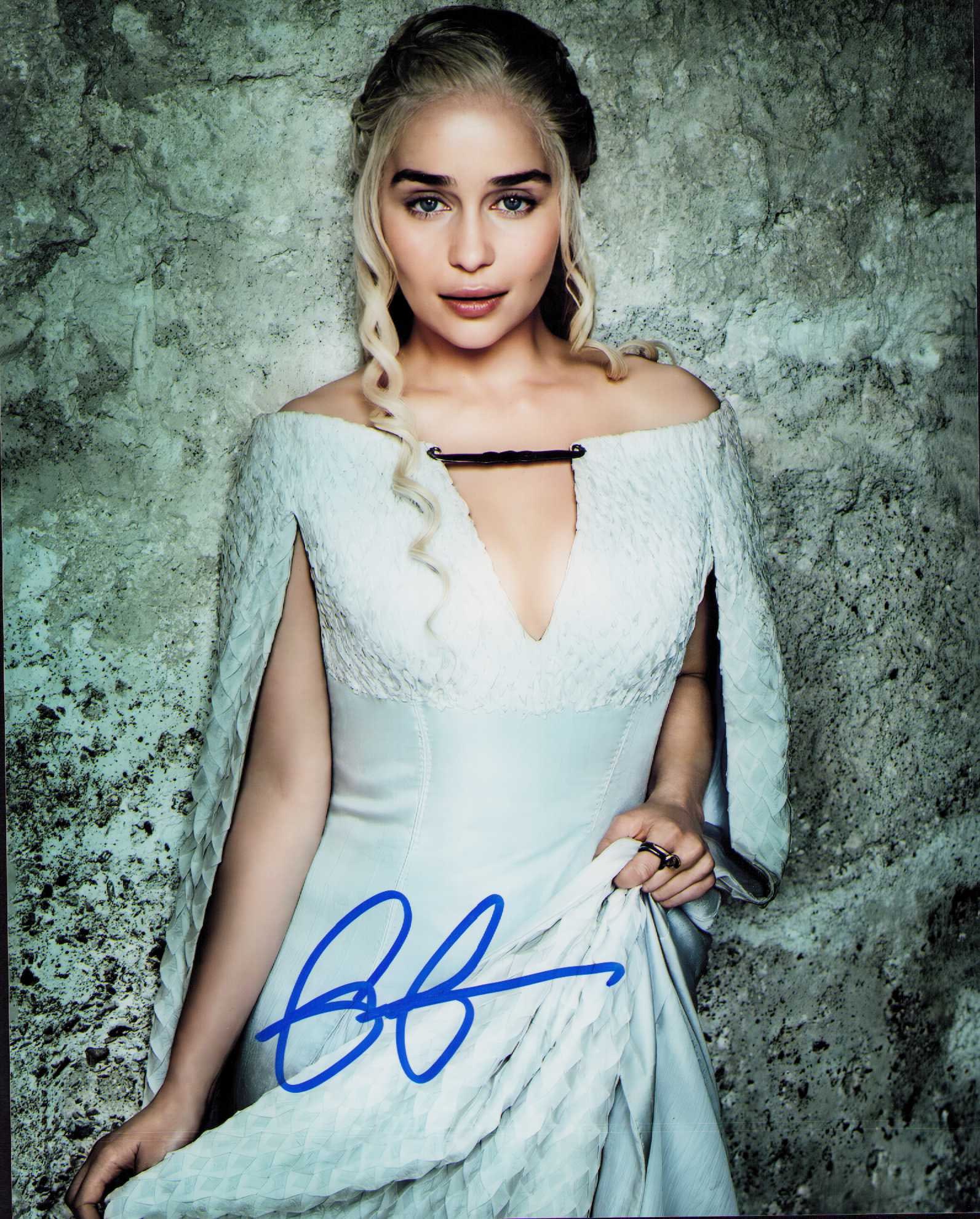 Emilia Clarke signed photograph: Sexy Game of Thrones star as the Mother of Dragons signed 8x10 photograph Certificate of AuthenticityEVERY item in this auction comes with at minimum one fully illustrated and serial numbered COA sign