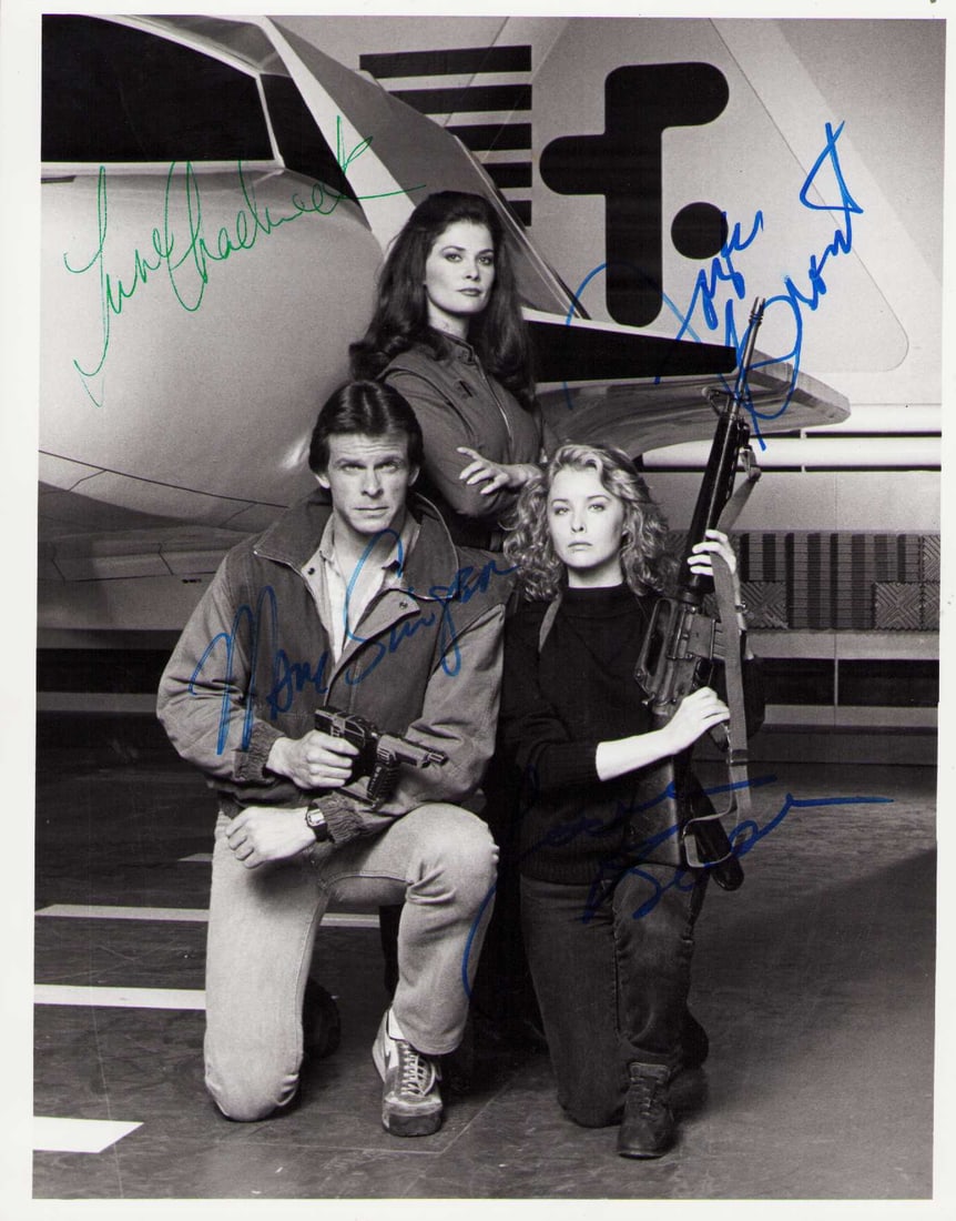 V cast signed photograph: June Chadwick Jane Badler Faye Grant and Marc Singer the original V cast of the hit sci fi show from the mid 1980s rare Certificate of AuthenticityEVERY item in this auction comes with at minimum one