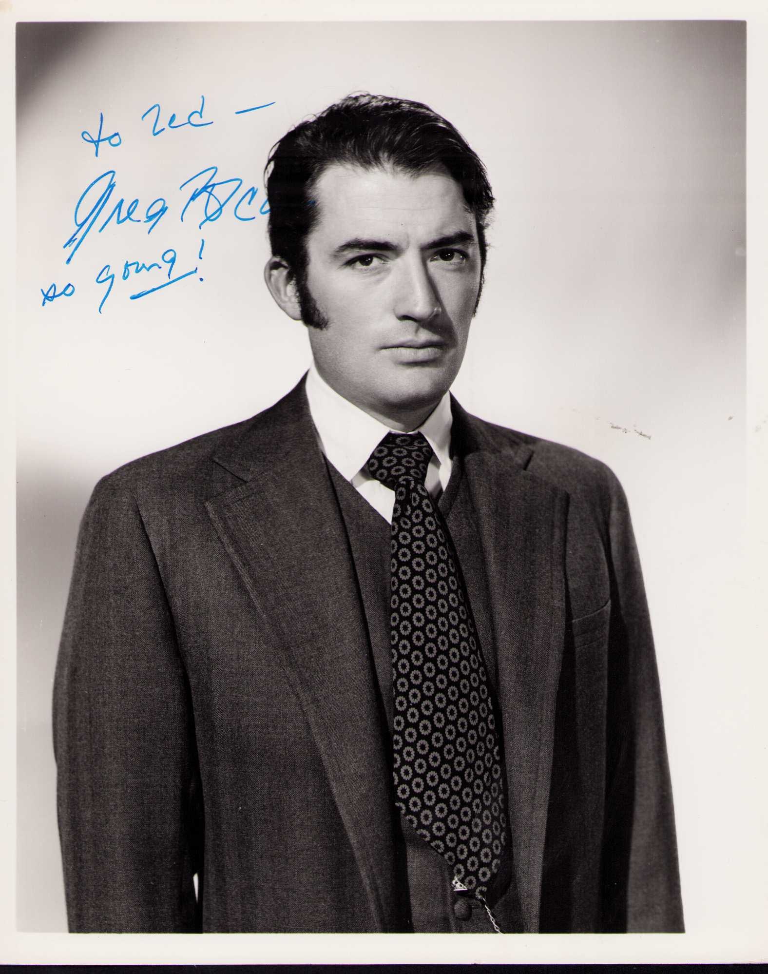 Gregory Peck signed photograph: A vintage original early still signed later in the 60s he adds SO YOUNG ! To it lol Certificate of AuthenticityEVERY item in this auction comes with at minimum one fully illustrated and serial numbere
