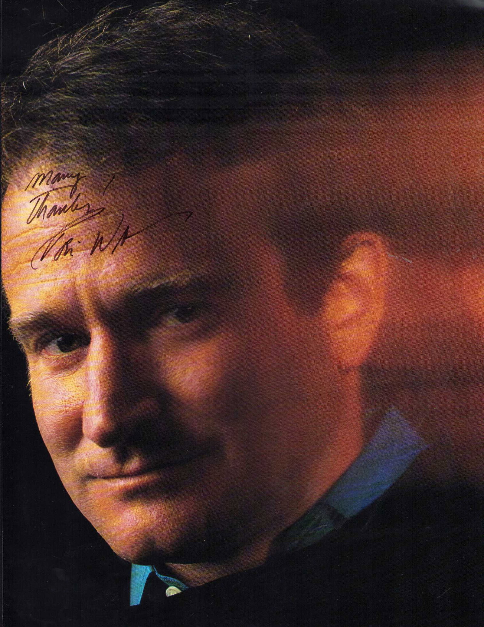 Robin Williams signed photograph: A large photo taken from a coffee table book signed by the legend 9x12 Certificate of AuthenticityEVERY item in this auction comes with at minimum one fully illustrated and serial numbered COA signed