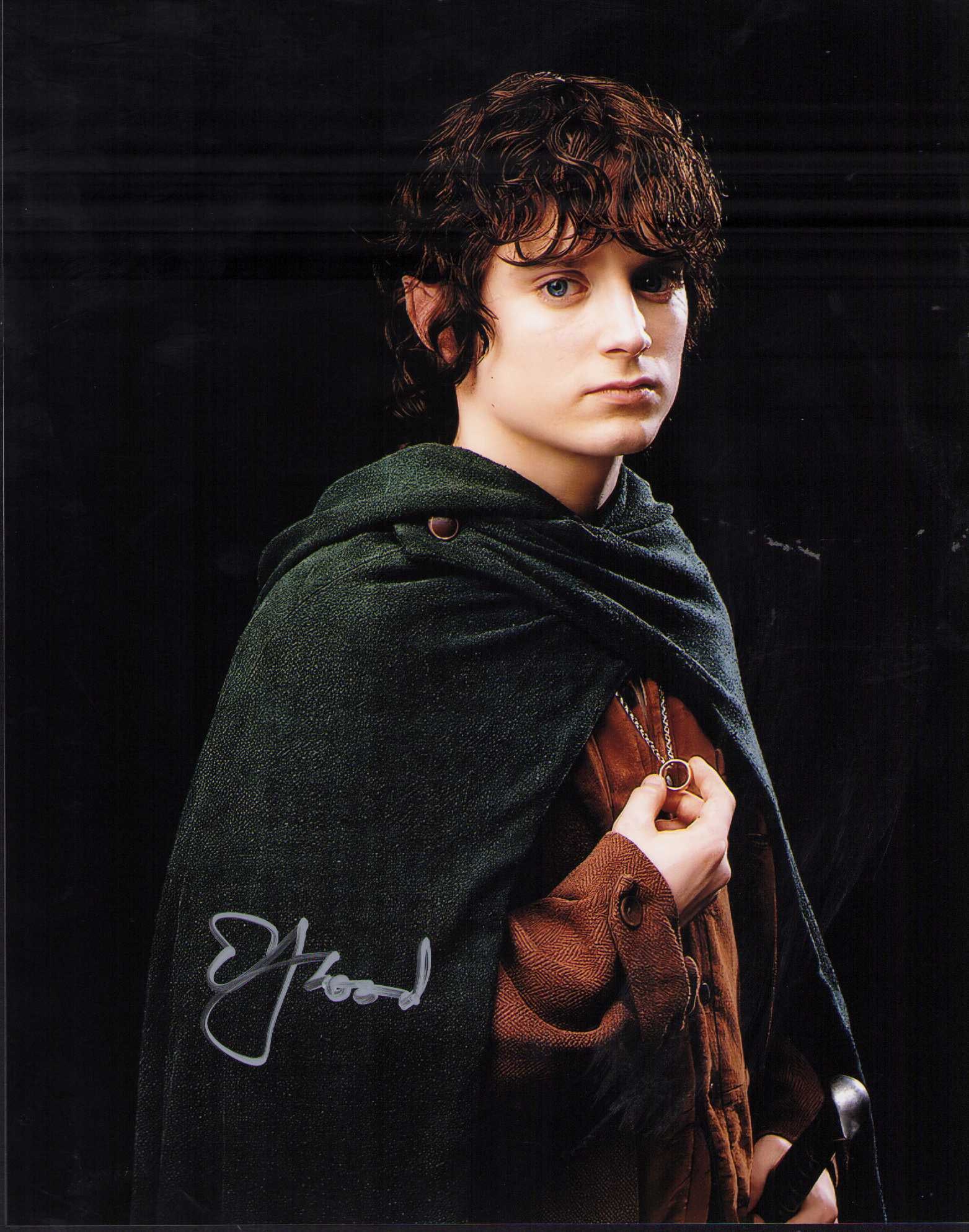 Elijah Wood signed photograph: Star of Lord of the Rings as Frodo in character 8x10 photograph Certificate of AuthenticityEVERY item in this auction comes with at minimum one fully illustrated and serial numbered COA signed by the