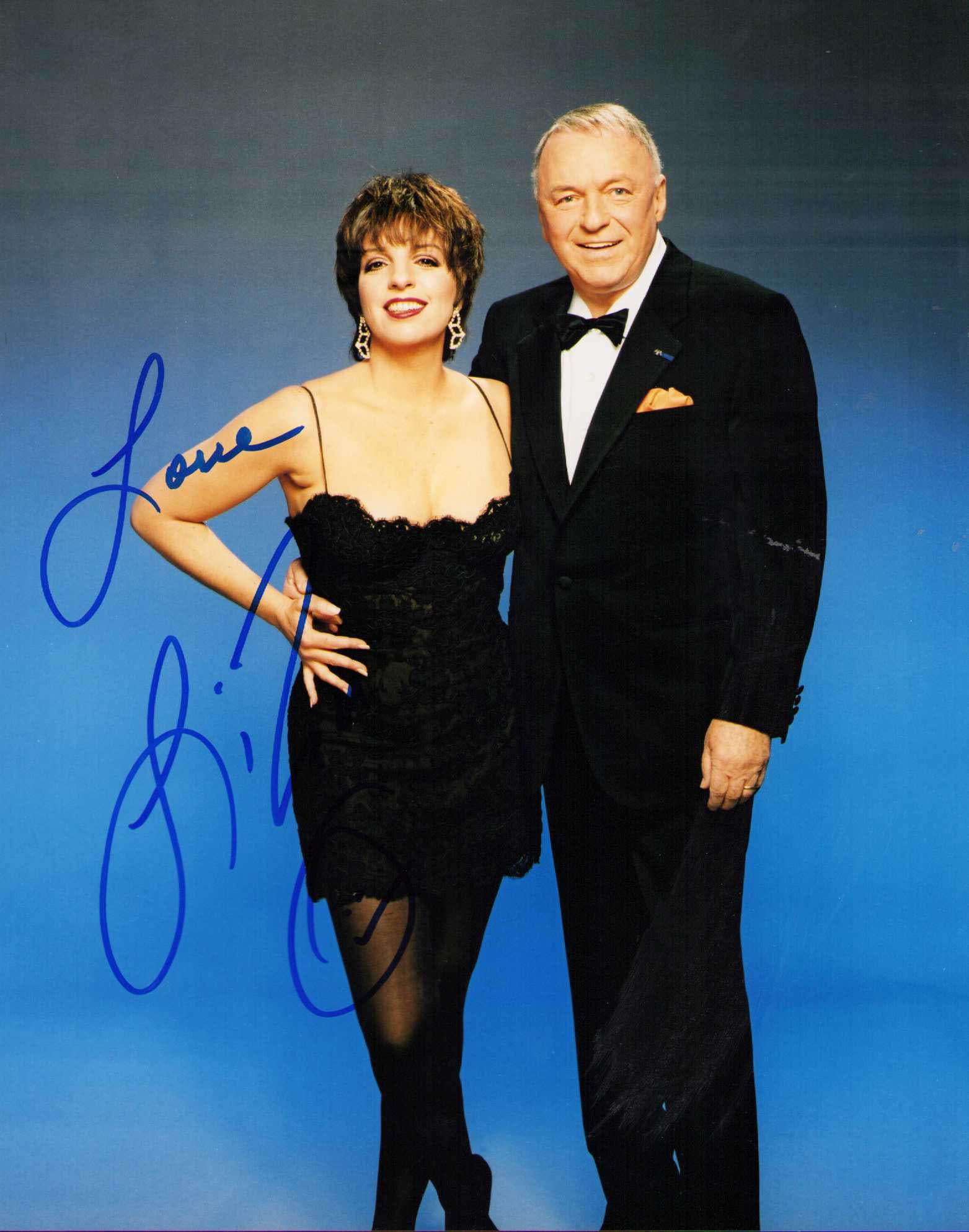 Liza Minelli signed photograph: A rare signer usually only secretary signed ones appear of the legend Judy Garlands daughter signed Liza Minelli Certificate of AuthenticityEVERY item in this auction comes with at minimum one fully i