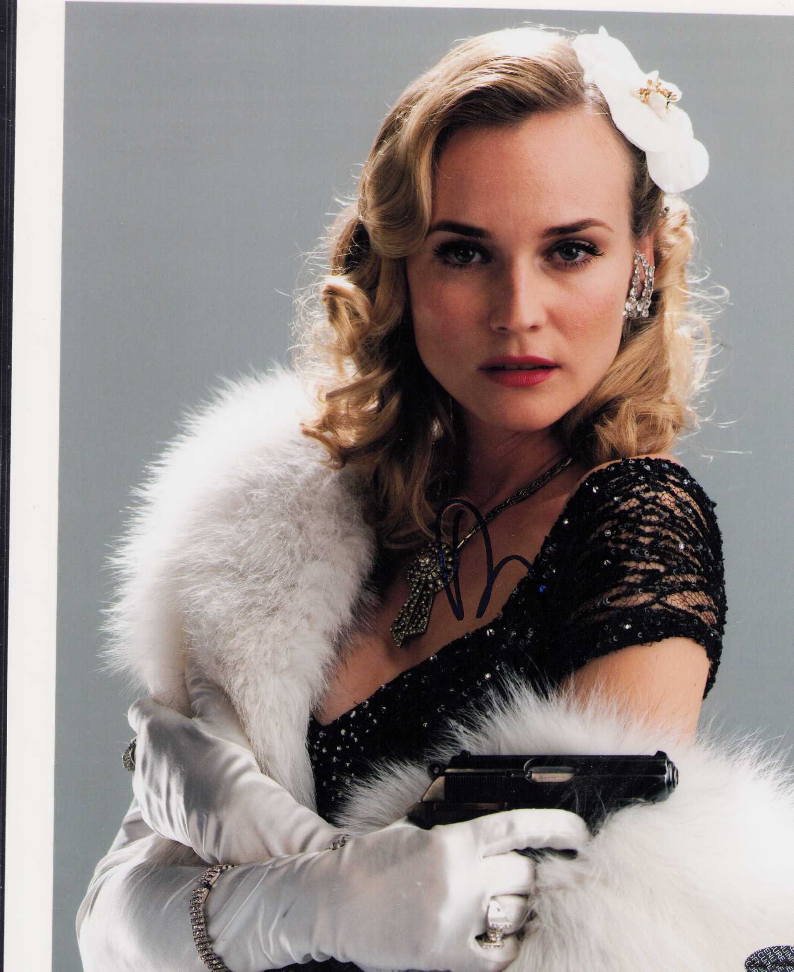Diane Kruger signed photograph: Inglorius Bastards signed in character 8x10 of her with sticker from the signing Certificate of AuthenticityEVERY item in this auction comes with at minimum one fully illustrated and serial numbered C