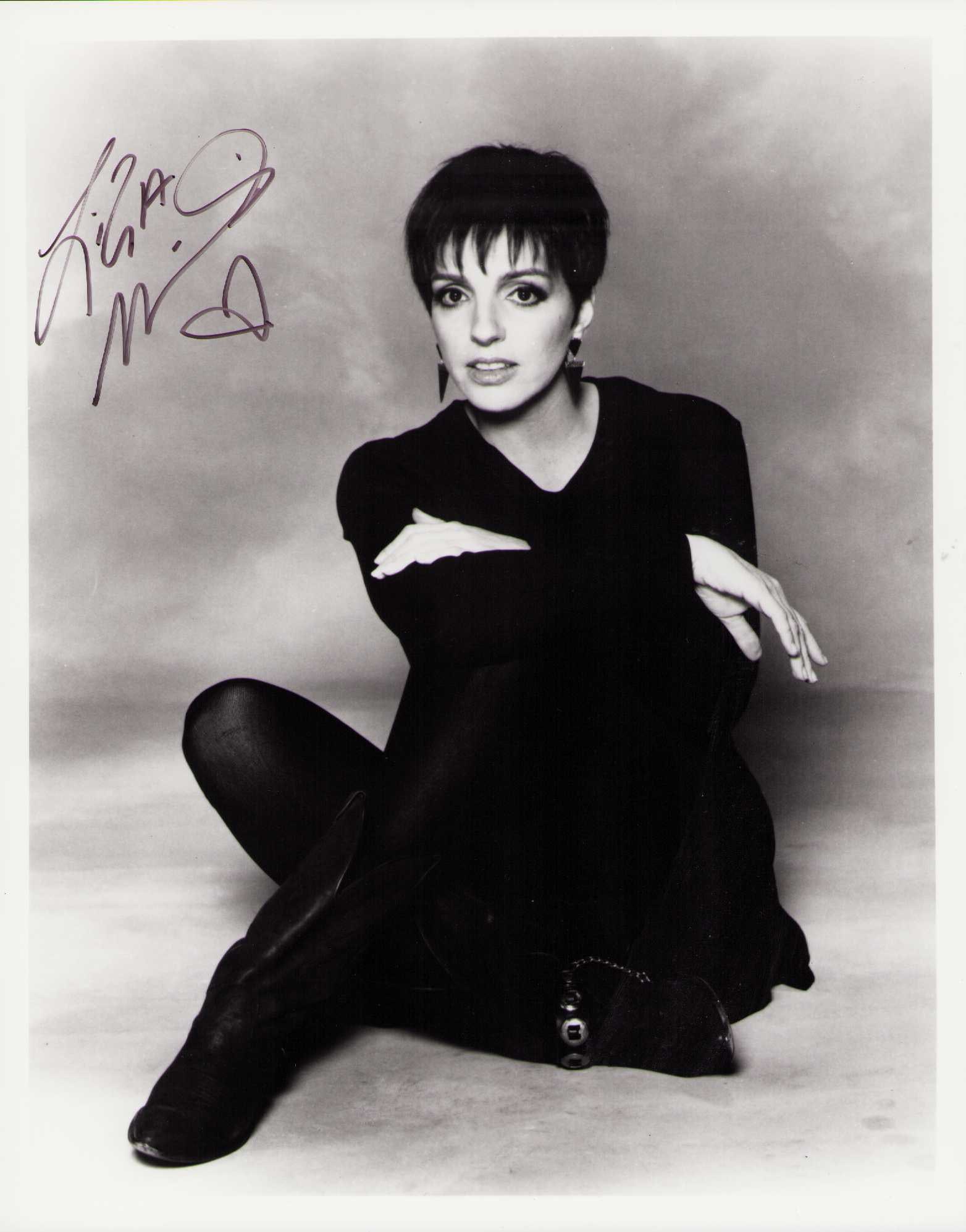 Liza Minelli signed photograph: A classic signed 8x10 by Judy Garlands daughter Liza with a Z Minelli the legend ! Certificate of AuthenticityEVERY item in this auction comes with at minimum one fully illustrated and serial numbered