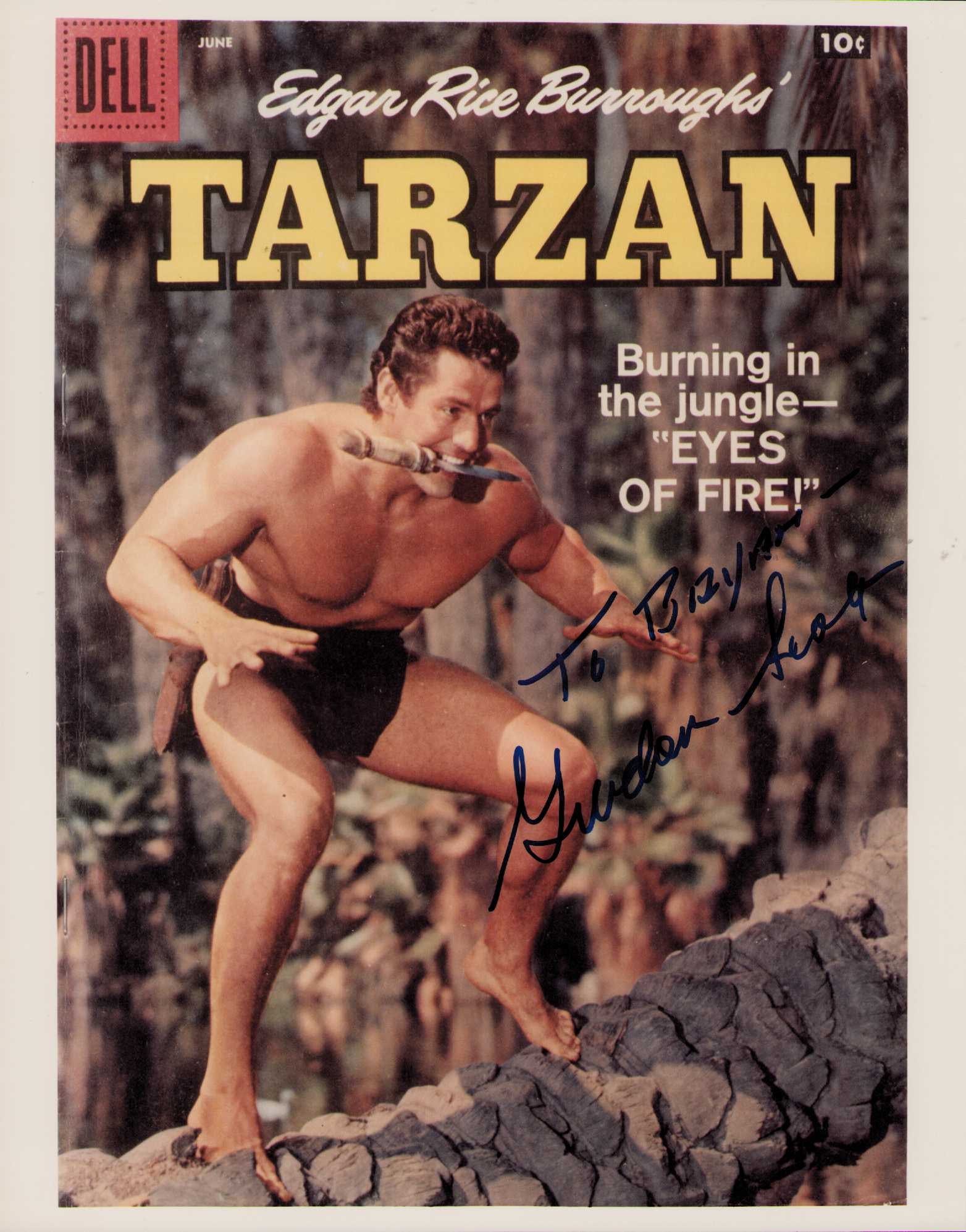 Gordon Scott Tarzan signed photograph: A color comic book cover in the form of a photograph signed by the Tarzan star Certificate of AuthenticityEVERY item in this auction comes with at minimum one fully illustrated and serial numbered COA