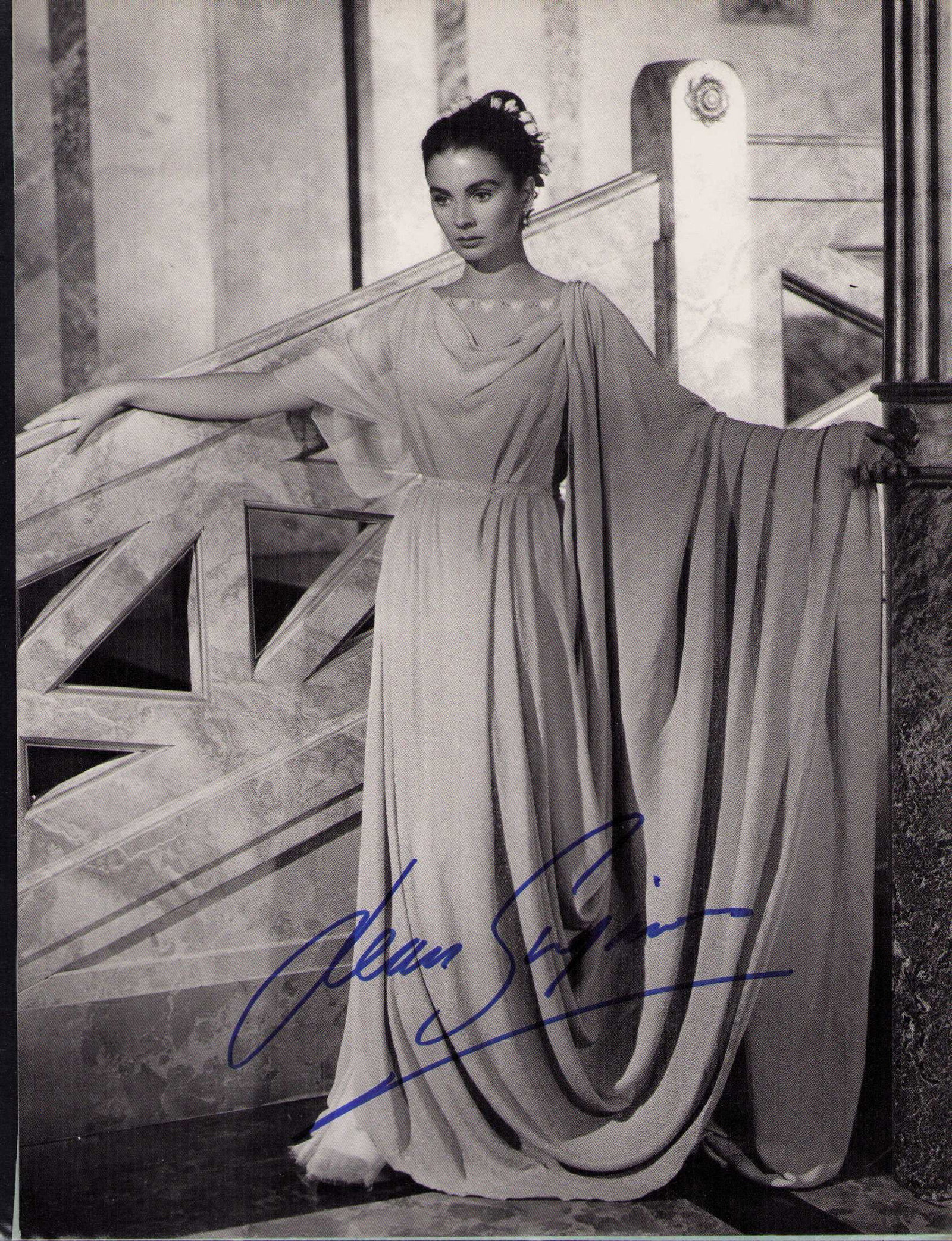 Jean Simmons signed photograph: A larger signed photograph 9x12 taken from a coffee table book signed by the legend Certificate of AuthenticityEVERY item in this auction comes with at minimum one fully illustrated and serial numbere