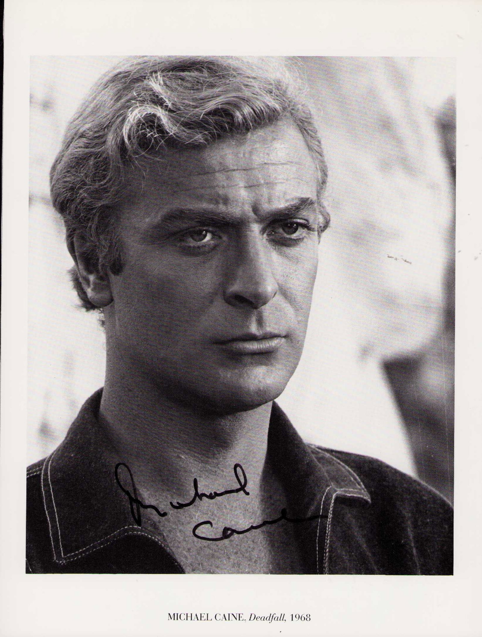 Michael Caine signed photograph: A vintage signed 8x10 photograph by the AA winning legend taken from a coffee table book Certificate of AuthenticityEVERY item in this auction comes with at minimum one fully illustrated and serial