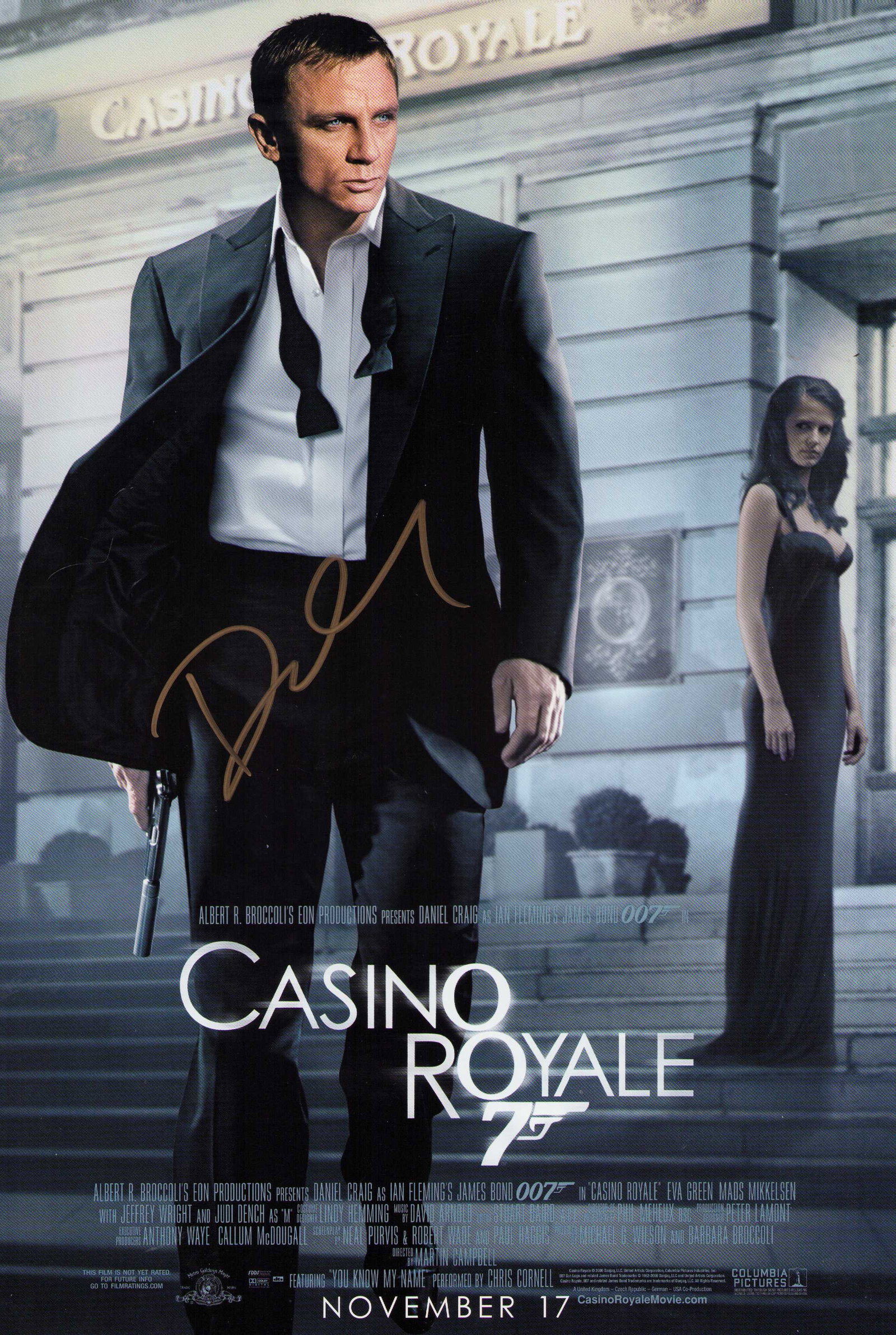 Daniel Craig James Bond signed premiere poster: An original premiere poster 11x17 signed by Daniel Craig as James Bond Certificate of AuthenticityEVERY item in this auction comes with at minimum one fully illustrated and serial numbered COA