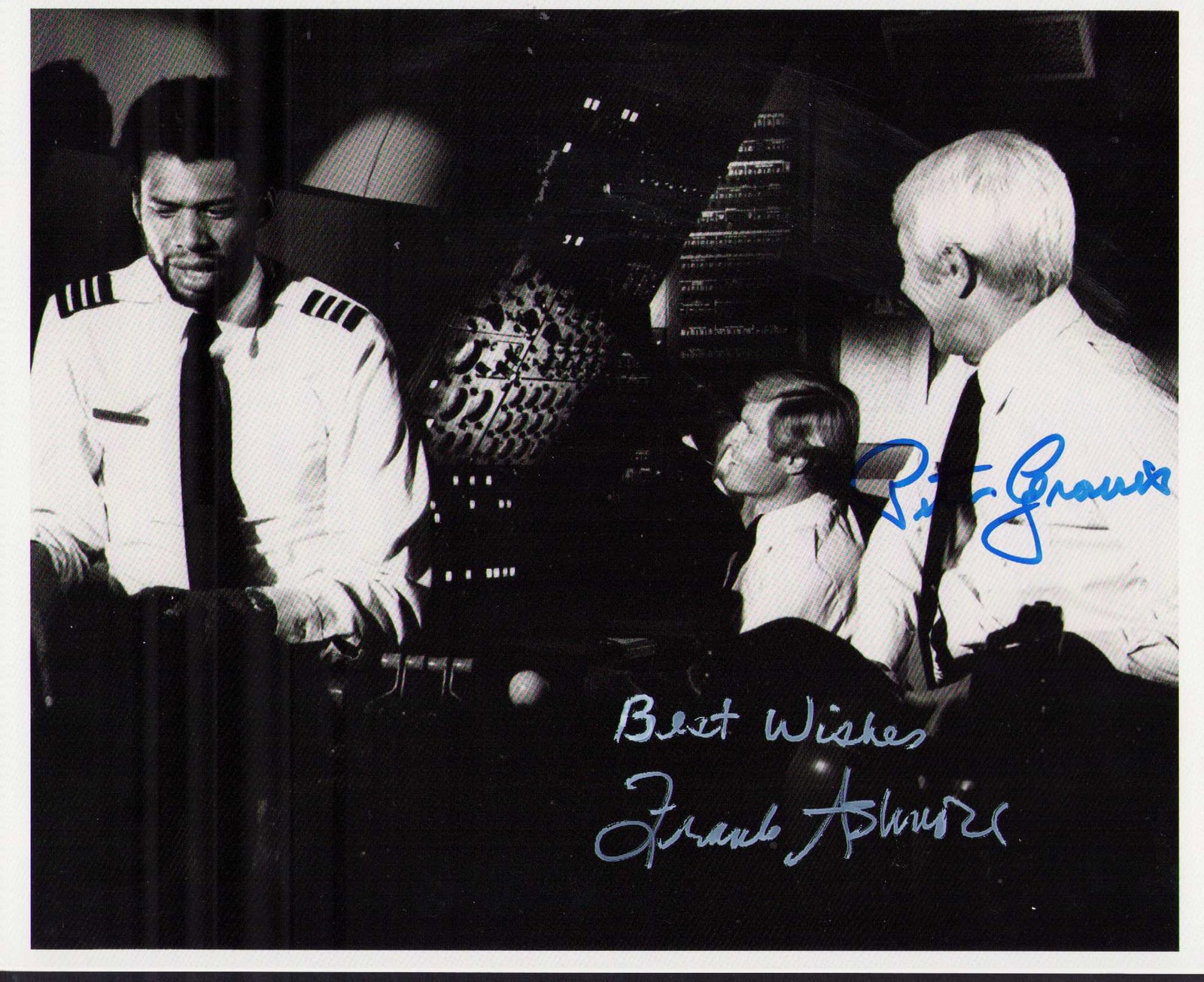 Airplane Frank Ashmore and Peter Graves signed photograph: An Airplane scene still signed by Frank Ashmore and star Peter Graves Certificate of AuthenticityEVERY item in this auction comes with at minimum one fully illustrated and serial numbered COA signed b