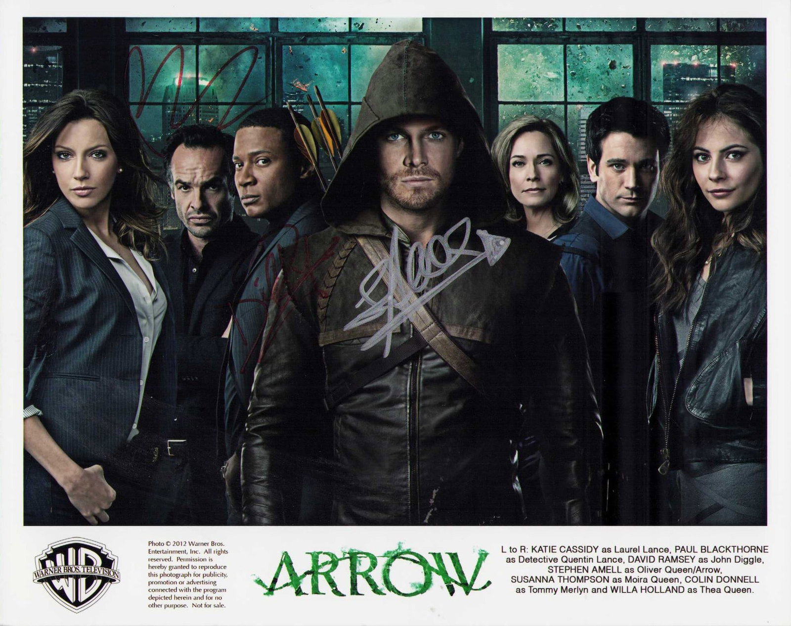 Stephen Amel and Katie Cassidy signed Arrow photograph: An ARROW cast photo signed by star Stephen Amel and costar Katie Cassidy Certificate of AuthenticityEVERY item in this auction comes with at minimum one fully illustrated and serial numbered COA signe