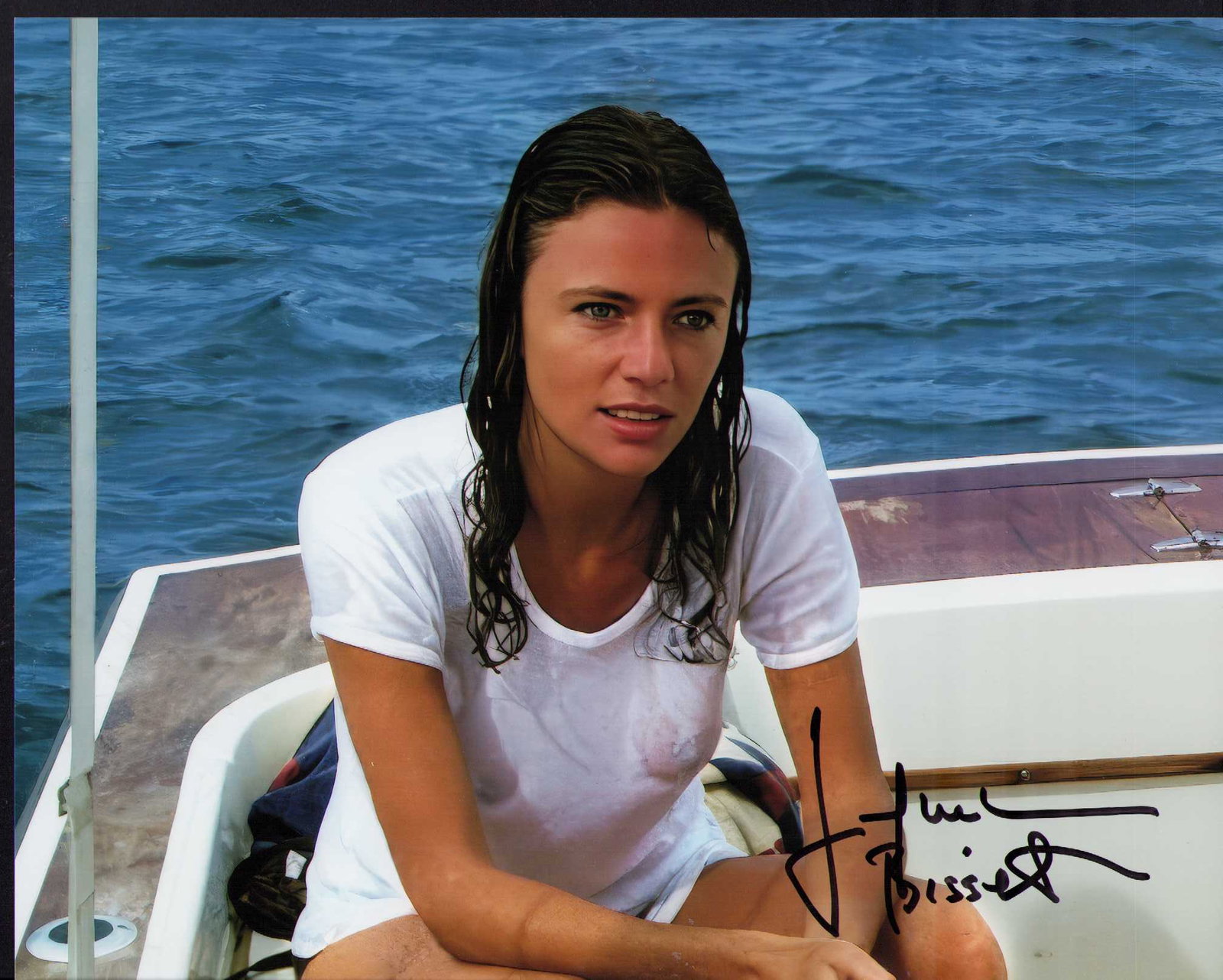 Jacqueline Bisset signed the DEEP photograph: A sexy DEEP signed 8x10 by her in famed wet tshirt from dive shots Certificate of AuthenticityEVERY item in this auction comes with at minimum one fully illustrated and serial numbered COA signed by