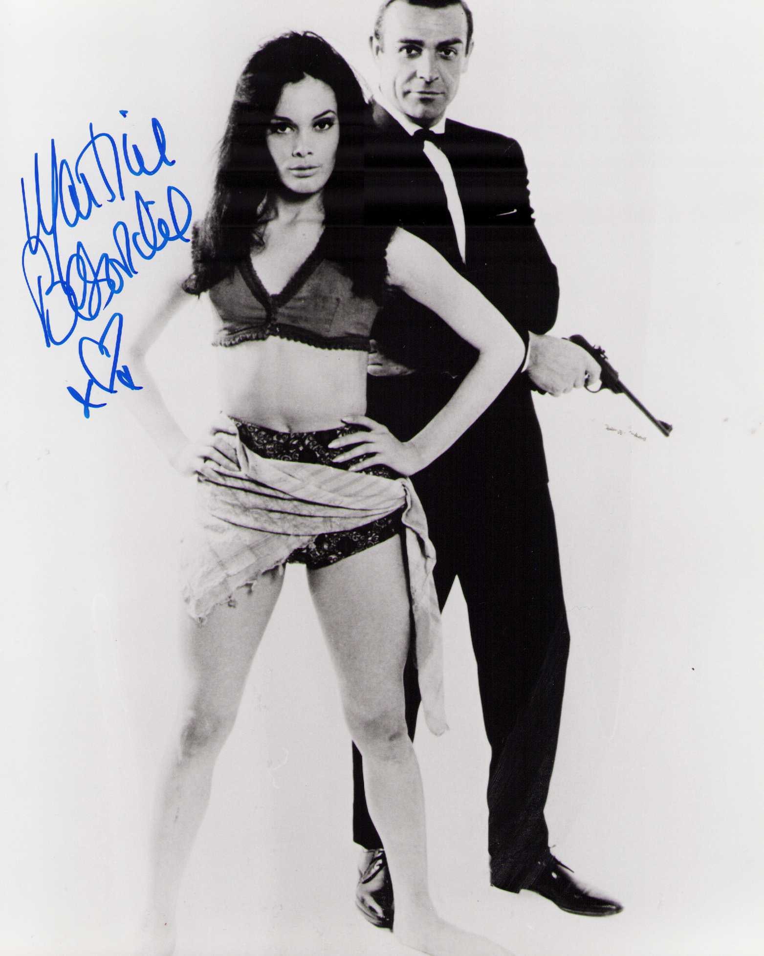 Martine Bestwicke signed Bond babe photograph: A sexy Bond babe signed 8x10 of her Certificate of AuthenticityEVERY item in this auction comes with at minimum one fully illustrated and serial numbered COA signed by the worlds leading authenticator