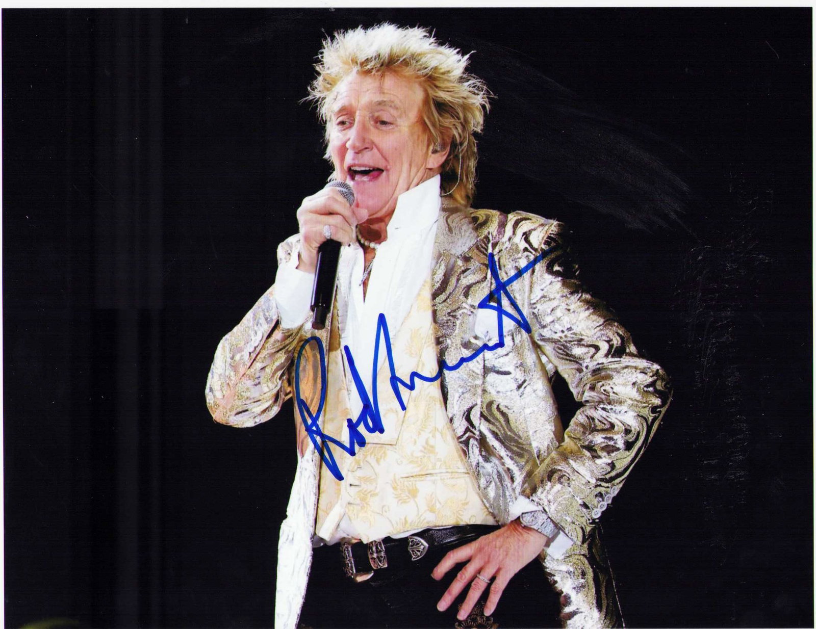 Rod Stewart signed photograph: A young signed 8x10 of the rock legend Certificate of AuthenticityEVERY item in this auction comes with at minimum one fully illustrated and serial numbered COA signed by the worlds leading authentica
