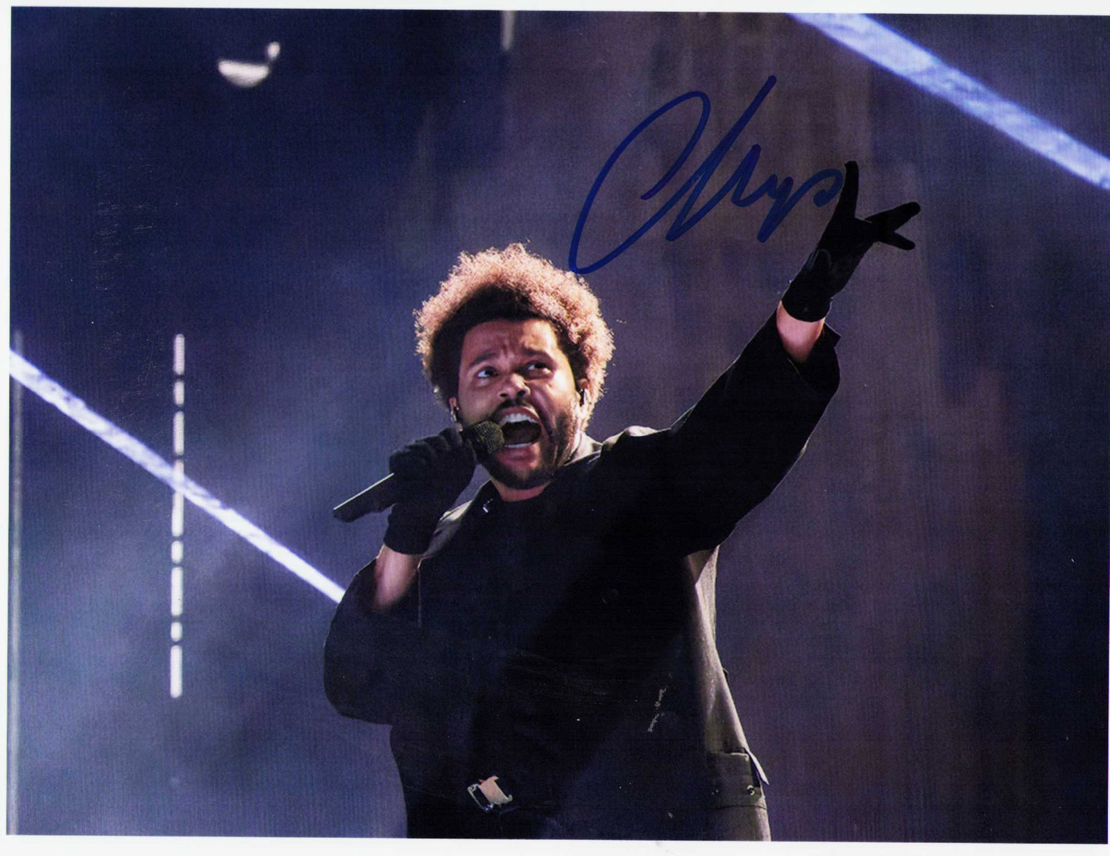 The Weeknd signed photograph: A rare signer signed 8x10 by the pop star Certificate of AuthenticityEVERY item in this auction comes with at minimum one fully illustrated and serial numbered COA signed by the worlds leading authent