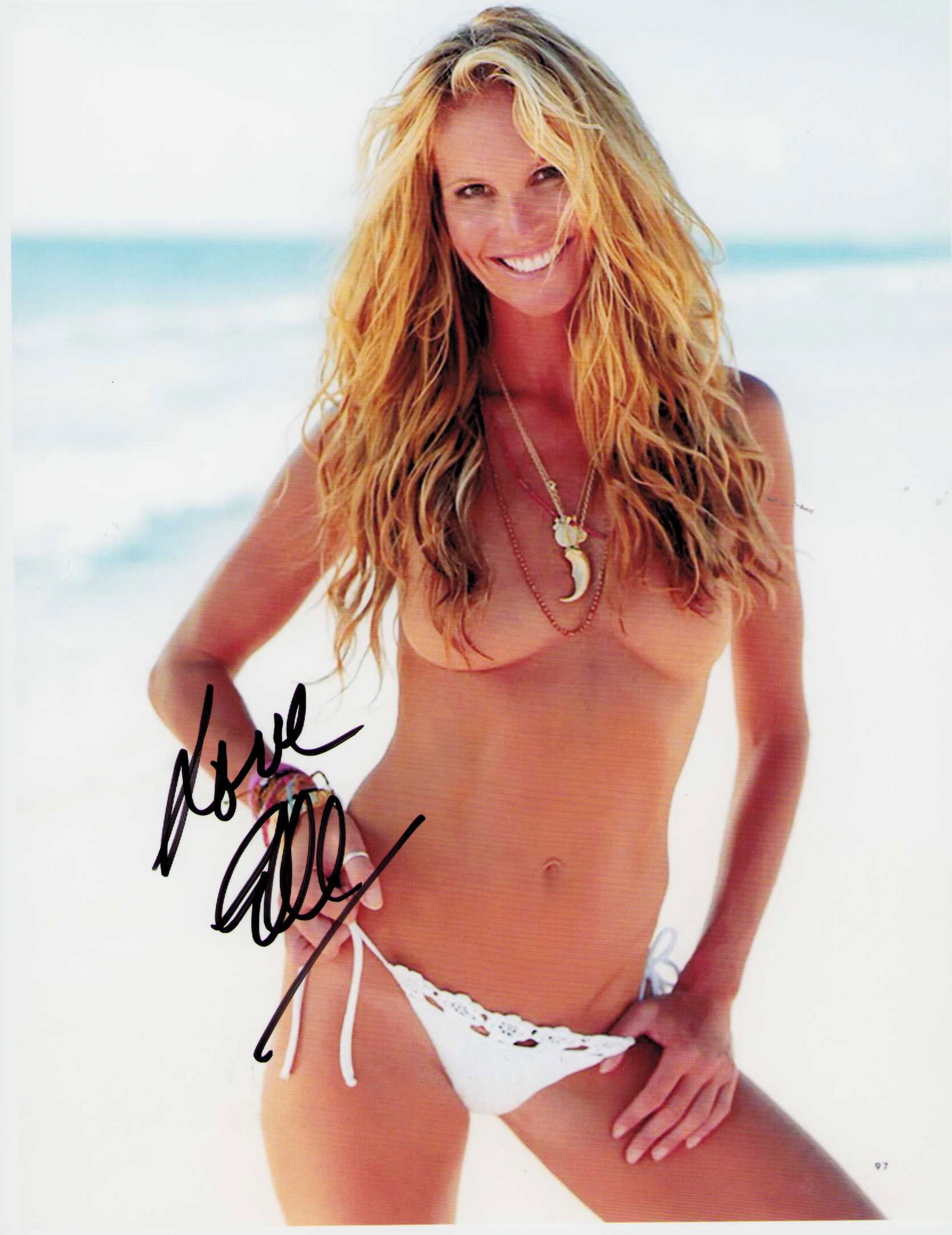 Elle MacPhearson signed photograph: A sexy signed photograph of the supermodel topless ! Certificate of AuthenticityEVERY item in this auction comes with at minimum one fully illustrated and serial numbered COA signed by the worlds lead