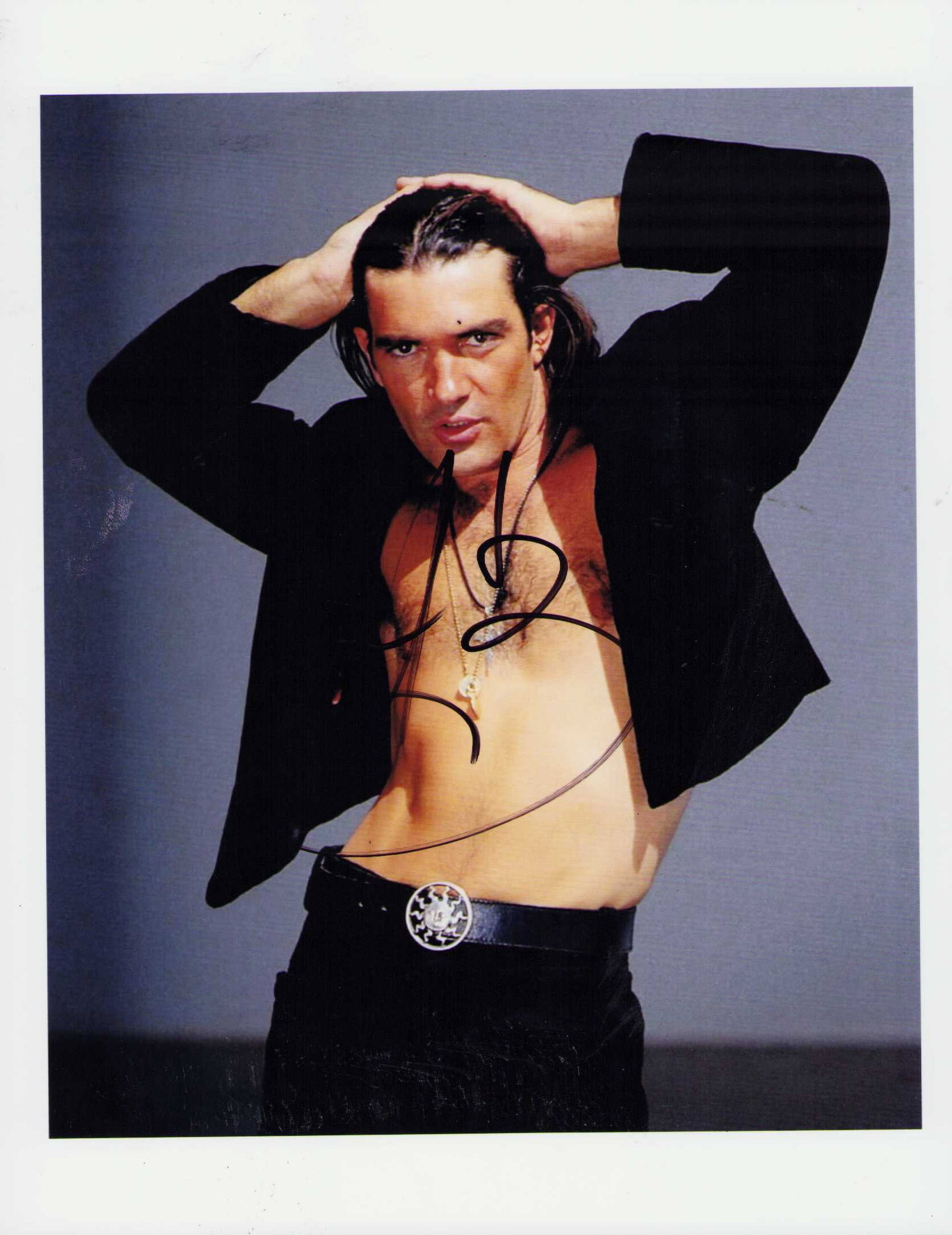 Antonio Banderas signed photograph: A young signed 8x10 of the actor Certificate of AuthenticityEVERY item in this auction comes with at minimum one fully illustrated and serial numbered COA signed by the worlds leading authenticator in