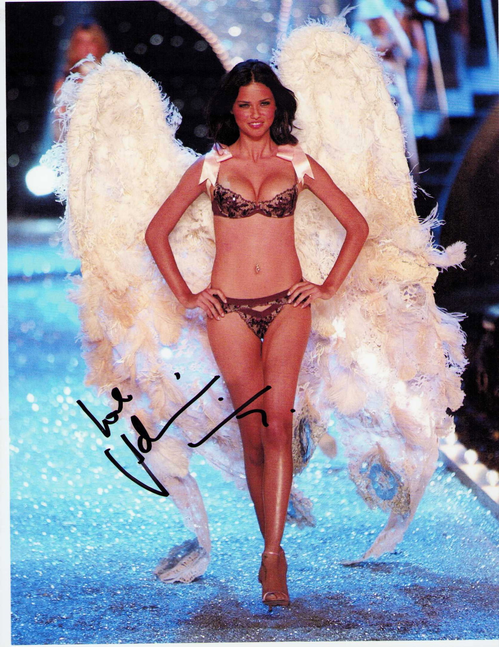 Adriana Lima signed photograph: A sexy signed 8x10 of the most famous of the victorias secret models Certificate of AuthenticityEVERY item in this auction comes with at minimum one fully illustrated and serial numbered COA signed by
