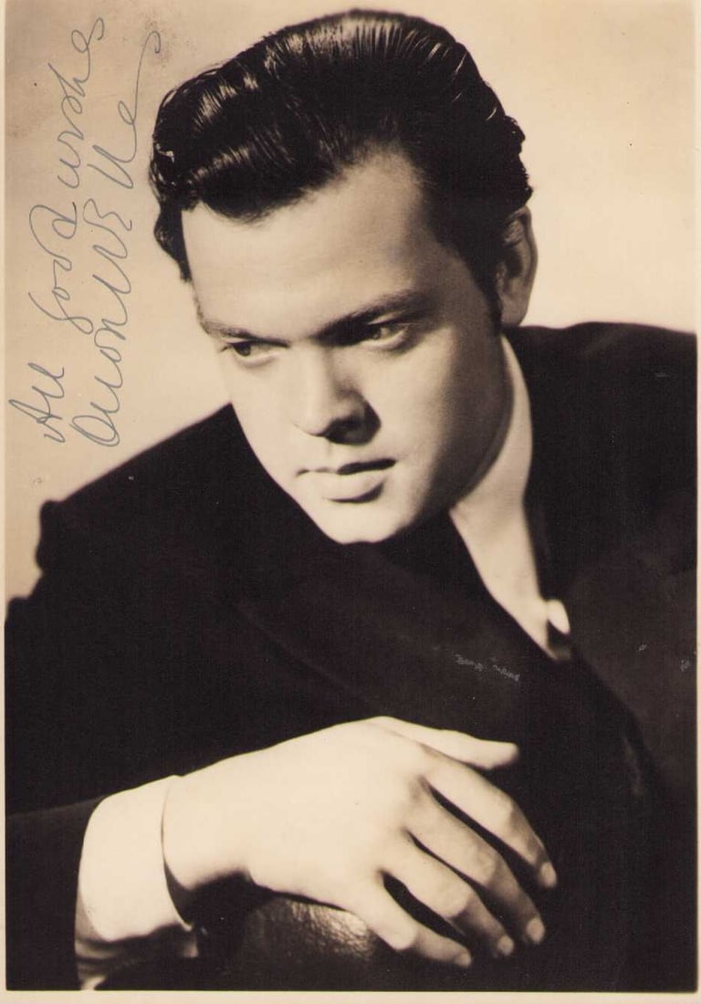 Orson Welles signed photograph: A wonderful sepia toned signed 6x7 of the famed actor Director of War of the Worlds Citizen Kane etc Certificate of AuthenticityEVERY item in this auction comes with at minimum one fully illustrated