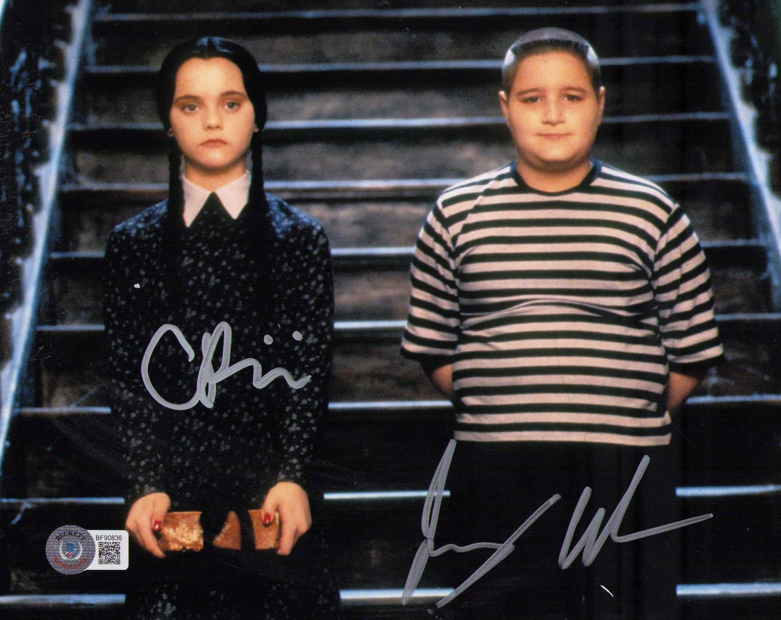 Jimmy Workman and Christina Ricci Addams Family signed photograph Beckett: An Addams Family film signed 8x10 by the two child stars Christina Ricci and Jimmy Workman Certificate of AuthenticityEVERY item in this auction comes with at minimum one fully illustrated and serial 