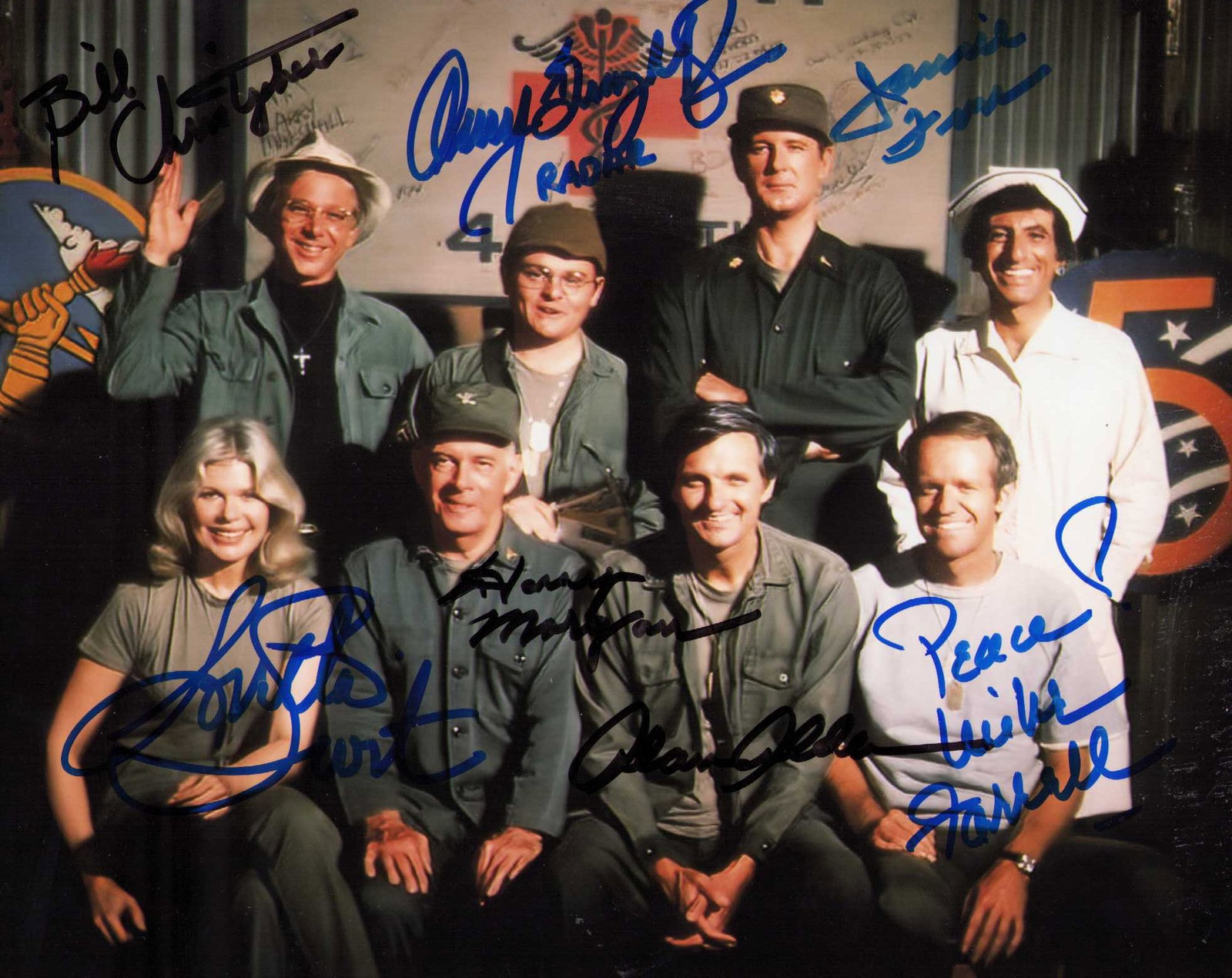MASH cast signed photograph: A MASH cast signed photograph by Alan Alda Loretta Swit Jamie Farr Bill Christopher Harry Morgan Gary Burghoff and Mike Farrell Certificate of AuthenticityEVERY item in this auction comes with at