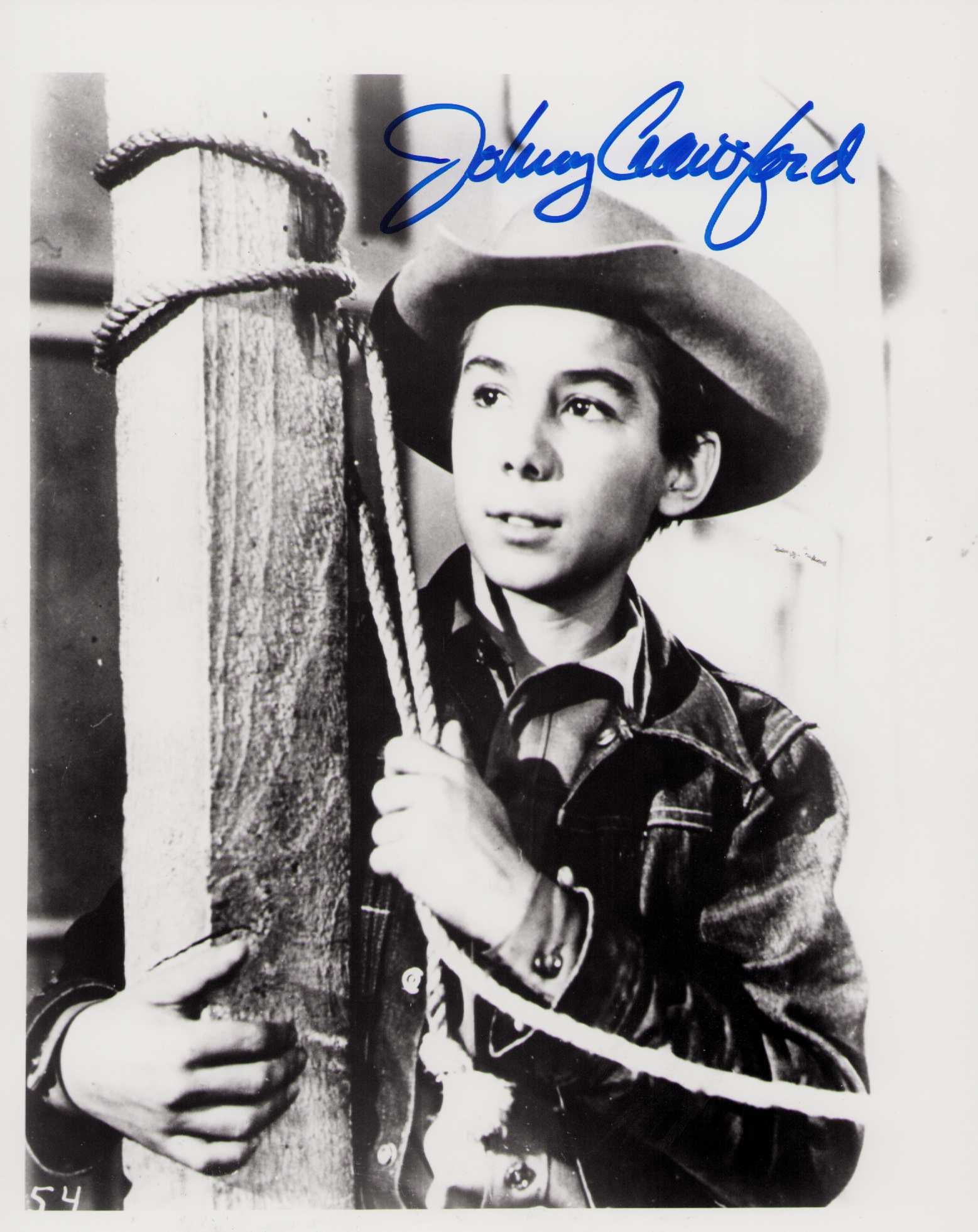 Johnny Crawford signed photograph: Rifleman costar child star Crawford signed on vintage still Certificate of AuthenticityEVERY item in this auction comes with at minimum one fully illustrated and serial numbered COA signed by the worl