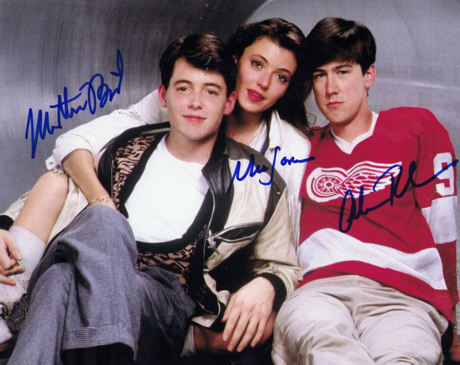 Ferris Buellers Day Off cast signed photograph: A cast signed 8x10 by Matthew Broderick Mia Sara and Alan Ruck Certificate of AuthenticityEVERY item in this auction comes with at minimum one fully illustrated and serial numbered COA signed by the w